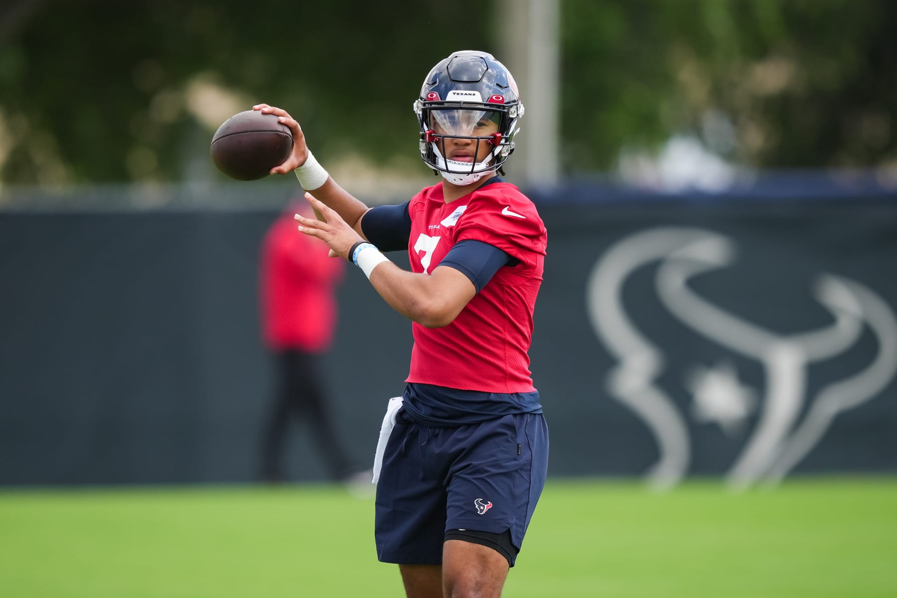 HOUSTON, TEXAS - MAY 12: Quarterback C.J Stroud #7 of the Houston Texans throws during the first day of Houston Texans Rookie Minicamp at NRG Stadium on May 12, 2023 in Houston, Texas. (Photo by Alex Bierens de Haan/Getty Images)