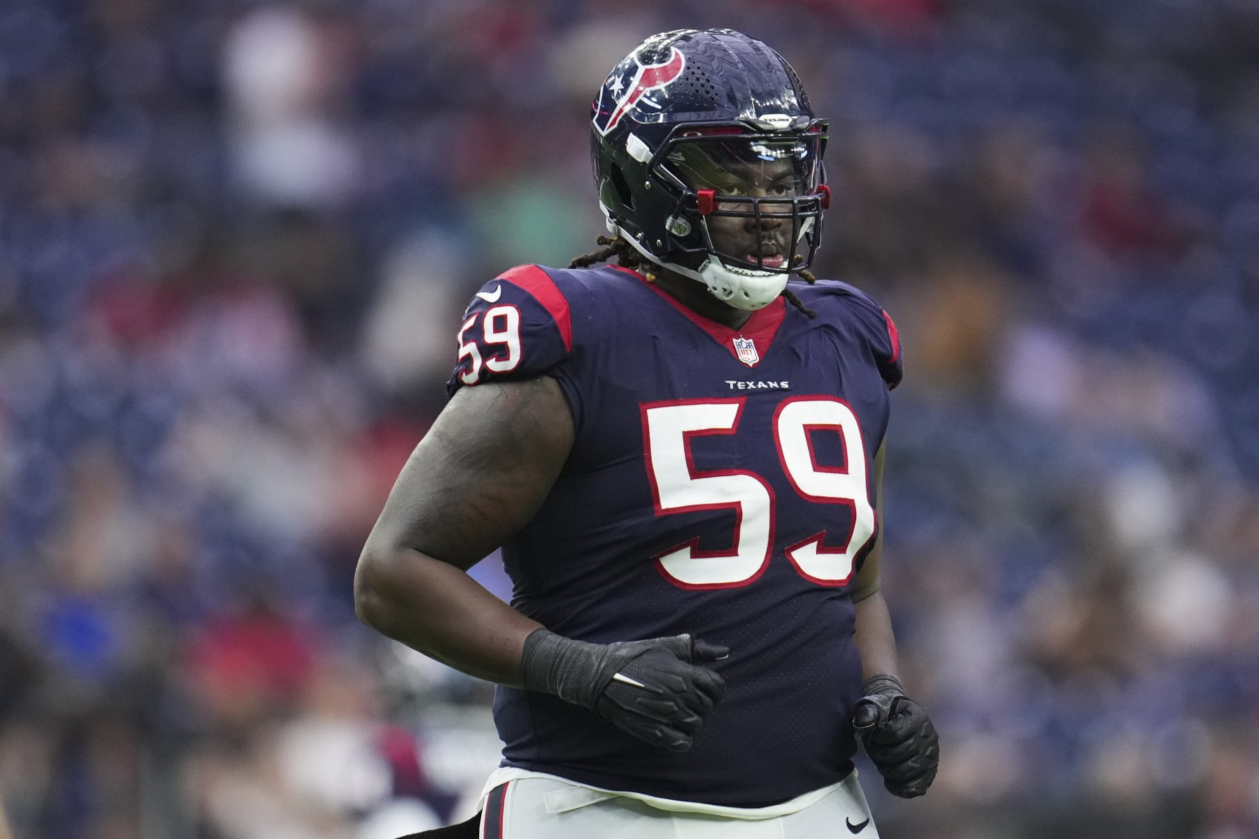 HOUSTON, TX - JANUARY 01: Kenyon Green #59 of the Houston Texans gets set against the Jacksonville Jaguars at NRG Stadium on January 1, 2023 in Houston, Texas. (Photo by Cooper Neill/Getty Images)