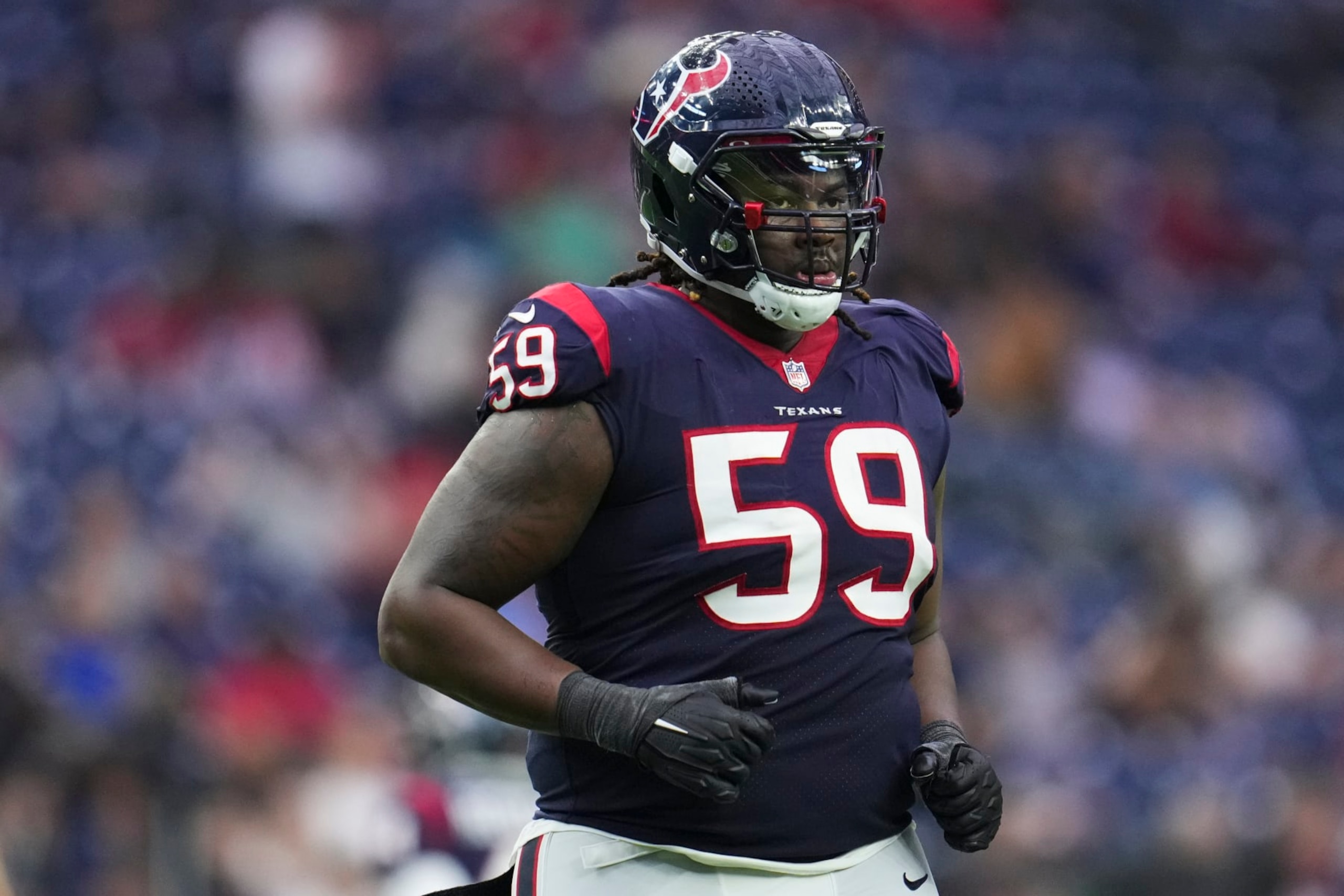 HOUSTON, TX - JANUARY 01: Kenyon Green #59 of the Houston Texans gets set against the Jacksonville Jaguars at NRG Stadium on January 1, 2023 in Houston, Texas. (Photo by Cooper Neill/Getty Images)