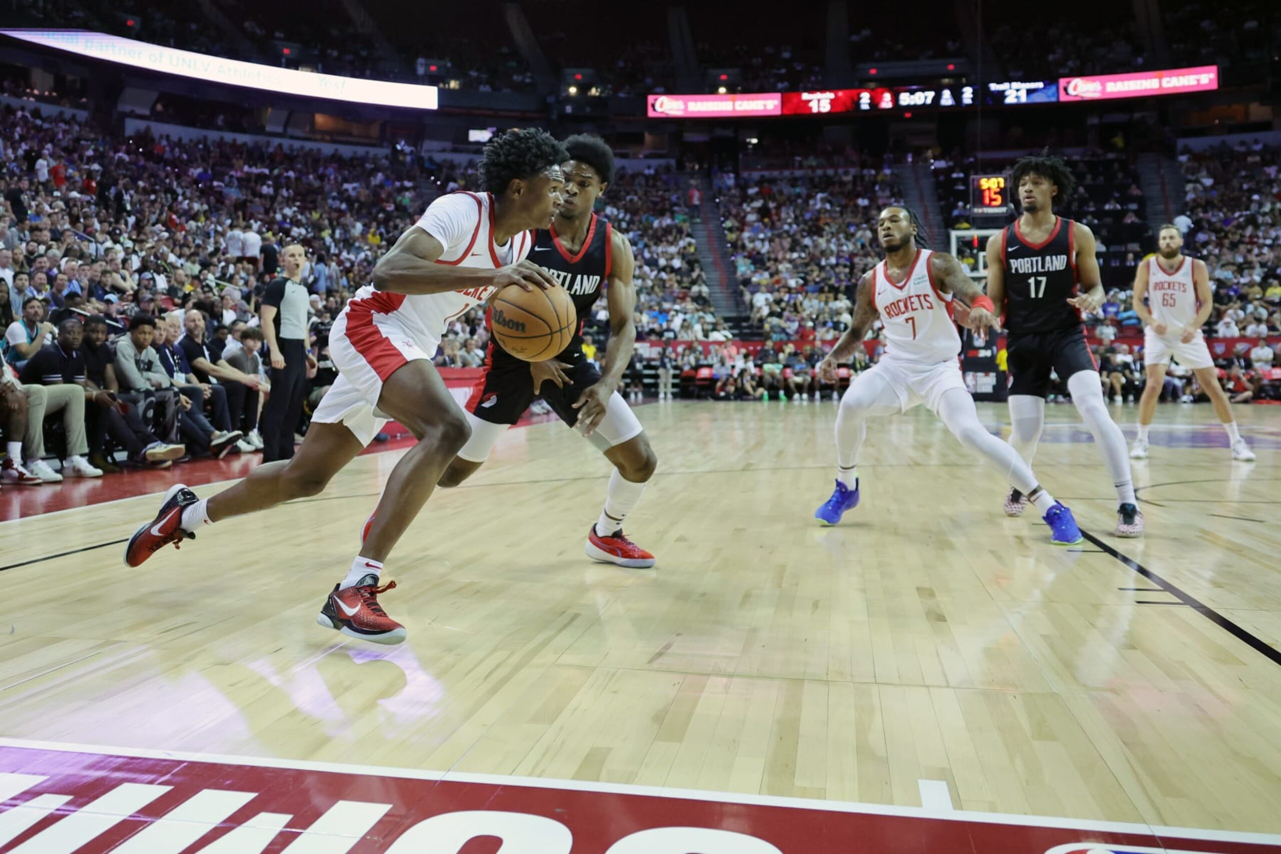 LAS VEGAS, NEVADA - JULY 07: Amen Thompson #1 of the Houston Rockets drives to the basket against Scoot Henderson #0 of the Portland Trail Blazers during the first quarter at the Thomas & Mack Center on July 07, 2023 in Las Vegas, Nevada. (Photo by Ethan Miller/Getty Images) LAS VEGAS, NEVADA - JULY 07: Amen Thompson #1 of the Houston Rockets drives to the basket against Scoot Henderson #0 of the Portland Trail Blazers during the first quarter at the Thomas & Mack Center on July 07, 2023 in Las Vegas, Nevada. (Photo by Ethan Miller/Getty Images)