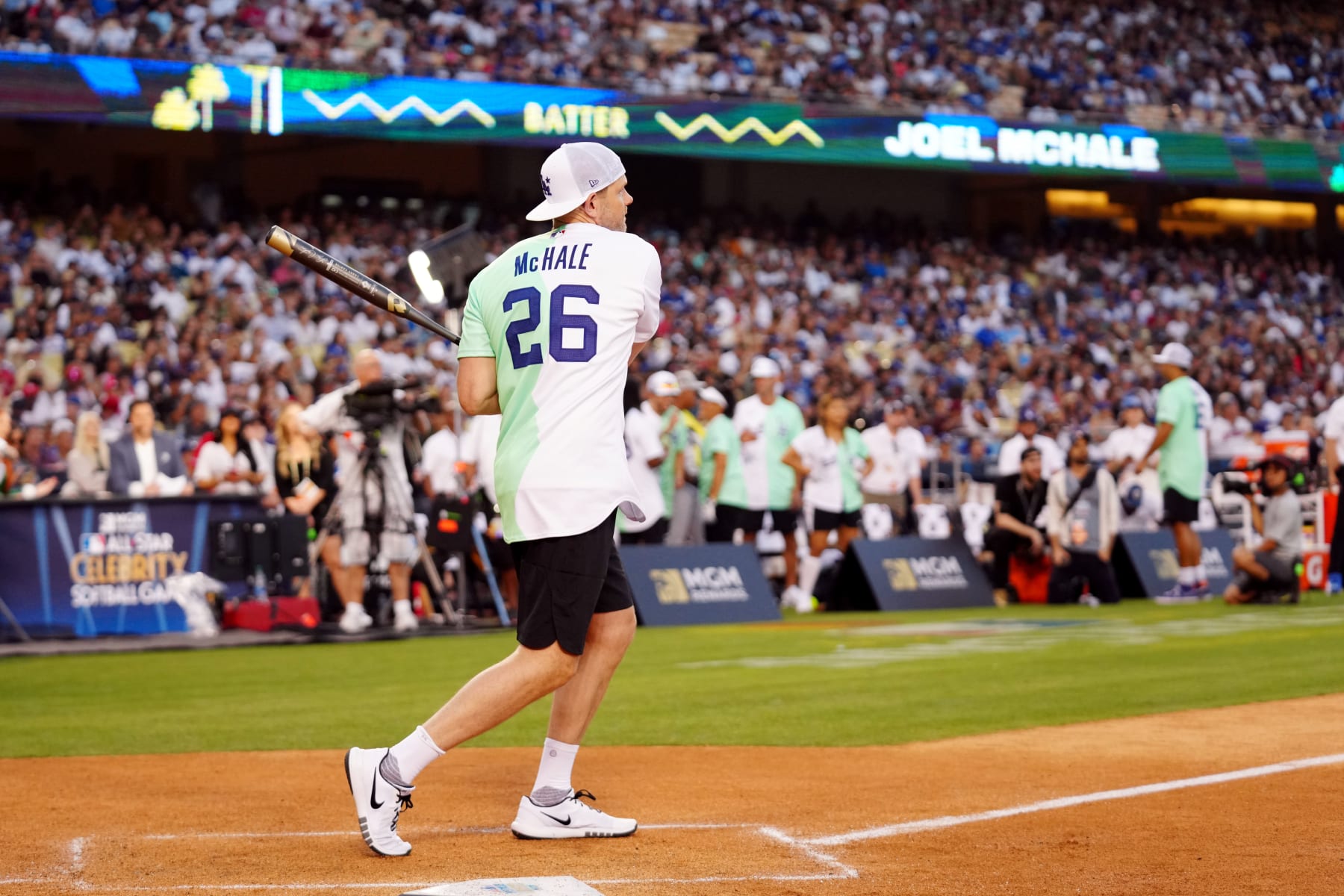 LOS ANGELES, CA - JULY 16:  Joel McHale bats during the MGM All-Star Celebrity Softball Game at Dodger Stadium on Saturday, July 16, 2022 in Los Angeles, California. (Photo by Daniel Shirey/MLB Photos via Getty Images)
