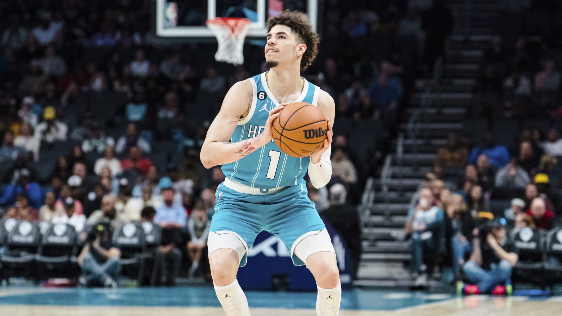 Charlotte Hornets guard LaMelo Ball (1) brings the ball up court against the Detroit Pistons during the second half of an NBA basketball game in Charlotte, N.C., Monday, Feb. 27, 2023. (AP Photo/Jacob Kupferman)