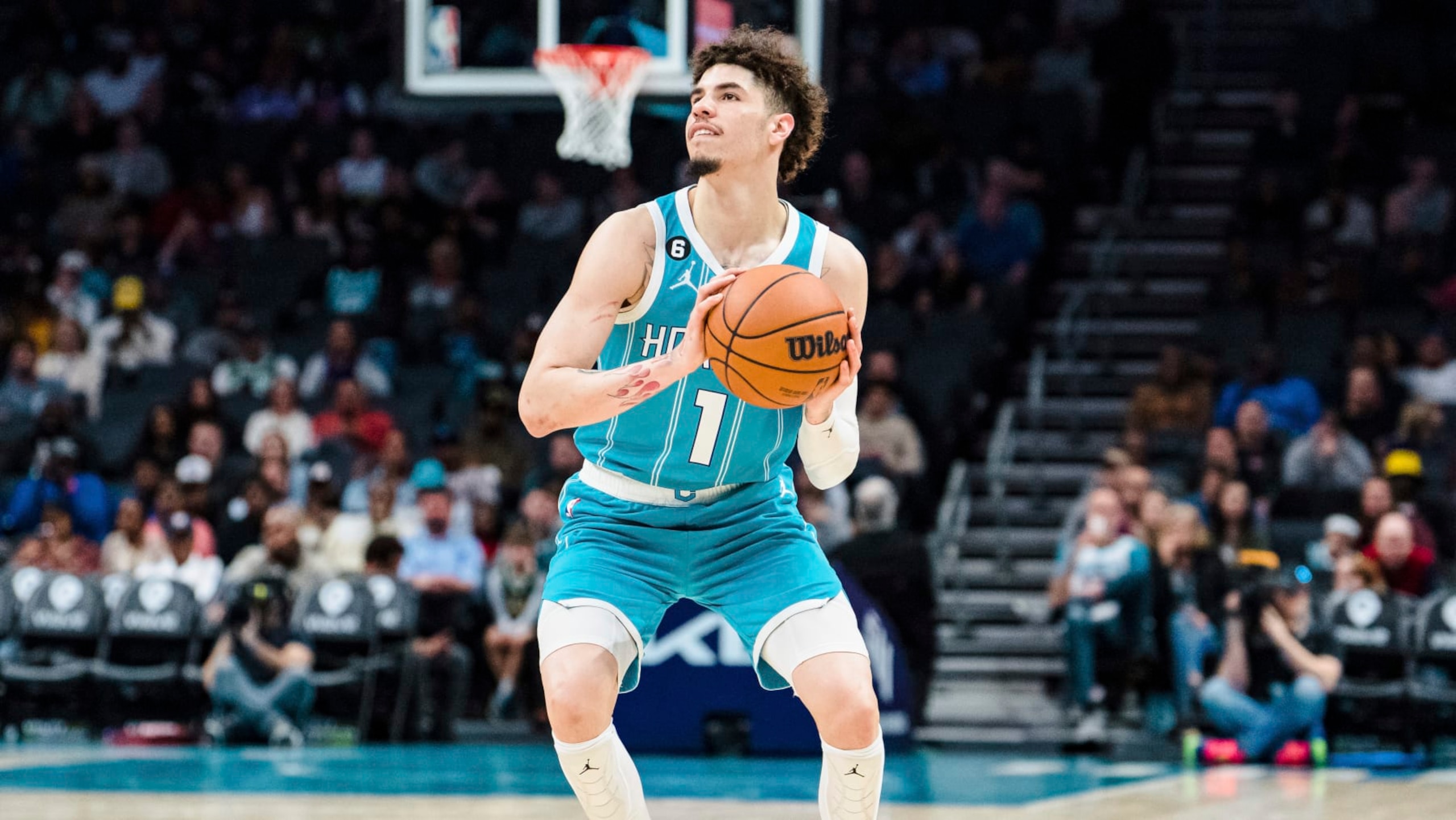 Charlotte Hornets guard LaMelo Ball (1) brings the ball up court against the Detroit Pistons during the second half of an NBA basketball game in Charlotte, N.C., Monday, Feb. 27, 2023. (AP Photo/Jacob Kupferman)