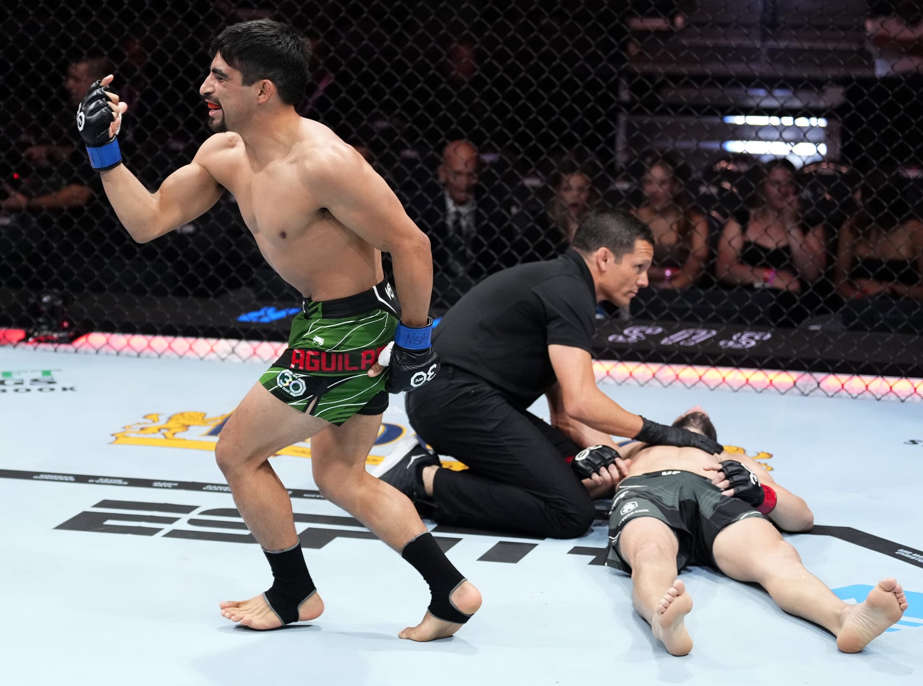 LAS VEGAS, NEVADA - JULY 08: Jesus Aguilar of Mexico reacts to his win in a flyweight fight during the UFC 290 event at T-Mobile Arena on July 08, 2023 in Las Vegas, Nevada. (Photo by Jeff Bottari/Zuffa LLC via Getty Images) LAS VEGAS, NEVADA - JULY 08: Jesus Aguilar of Mexico reacts to his win in a flyweight fight during the UFC 290 event at T-Mobile Arena on July 08, 2023 in Las Vegas, Nevada. (Photo by Jeff Bottari/Zuffa LLC via Getty Images)