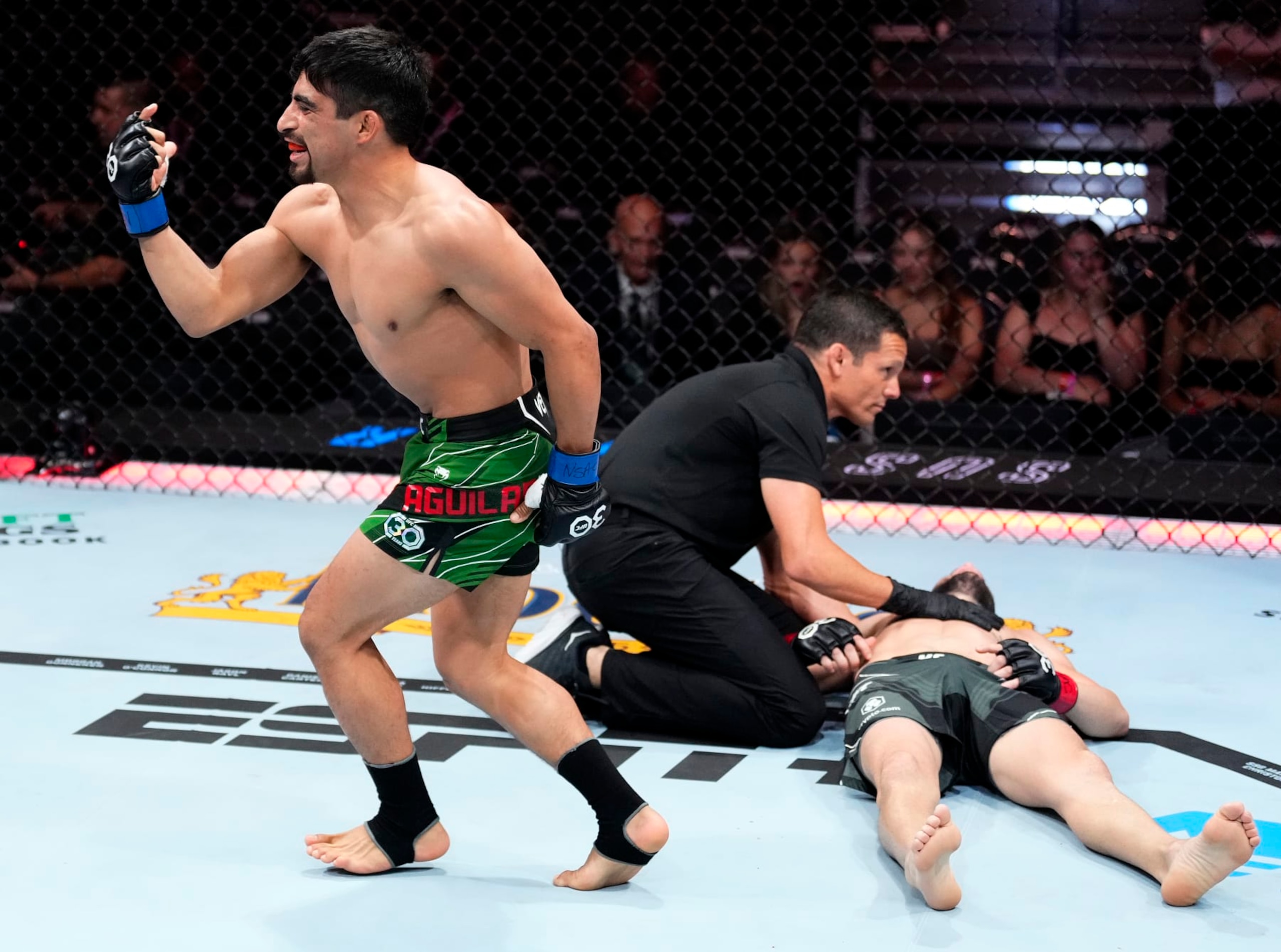 LAS VEGAS, NEVADA - JULY 08: Jesus Aguilar of Mexico reacts to his win in a flyweight fight during the UFC 290 event at T-Mobile Arena on July 08, 2023 in Las Vegas, Nevada. (Photo by Jeff Bottari/Zuffa LLC via Getty Images)