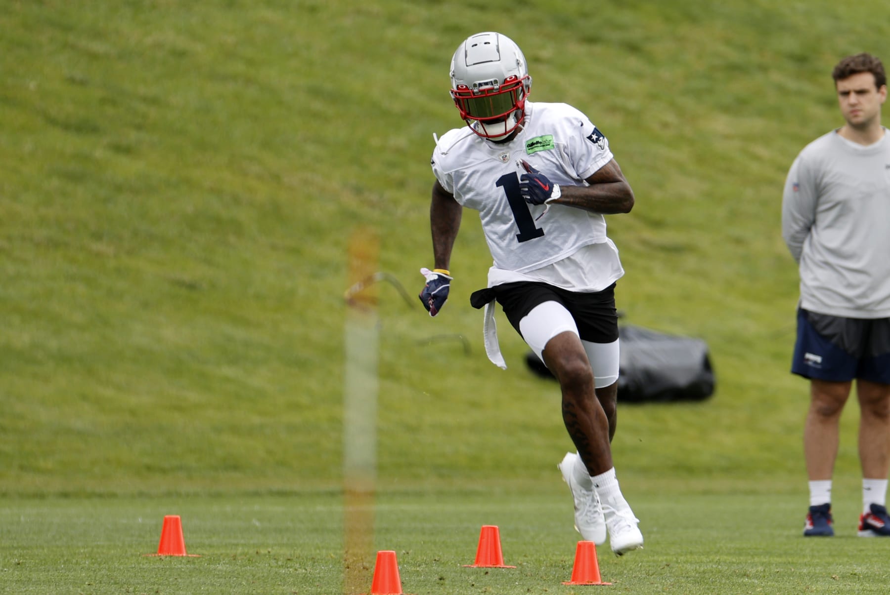 FOXBOROUGH, MA - JUNE 13: New England Patriots wide receiver DeVante Parker (1) runs the agility cones during New England Patriots Minicamp on June 13, 2023, at the Patriots Practice Facility at Gillette Stadium in Foxborough, Massachusetts. (Photo by Fred Kfoury III/Icon Sportswire via Getty Images)