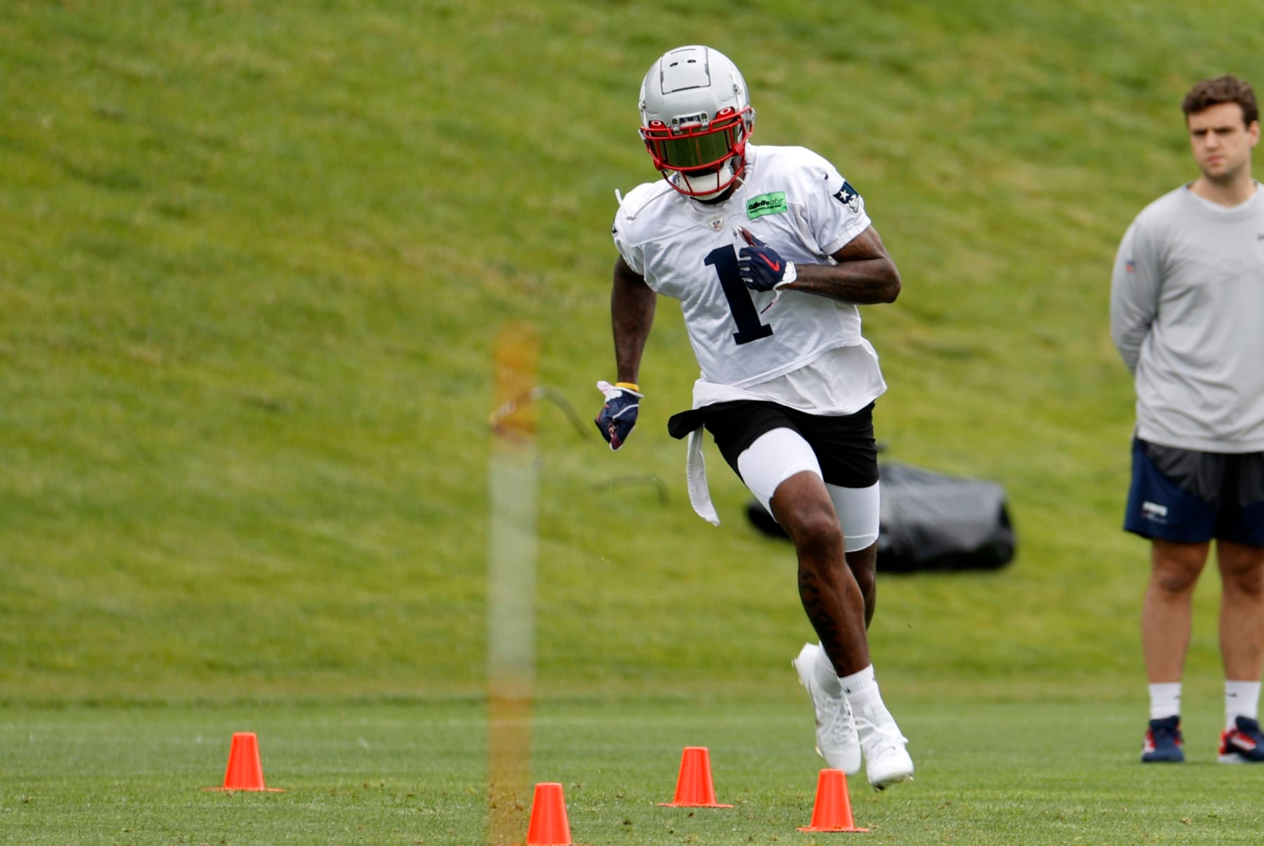 FOXBOROUGH, MA - JUNE 13: New England Patriots wide receiver DeVante Parker (1) runs the agility cones during New England Patriots Minicamp on June 13, 2023, at the Patriots Practice Facility at Gillette Stadium in Foxborough, Massachusetts. (Photo by Fred Kfoury III/Icon Sportswire via Getty Images)