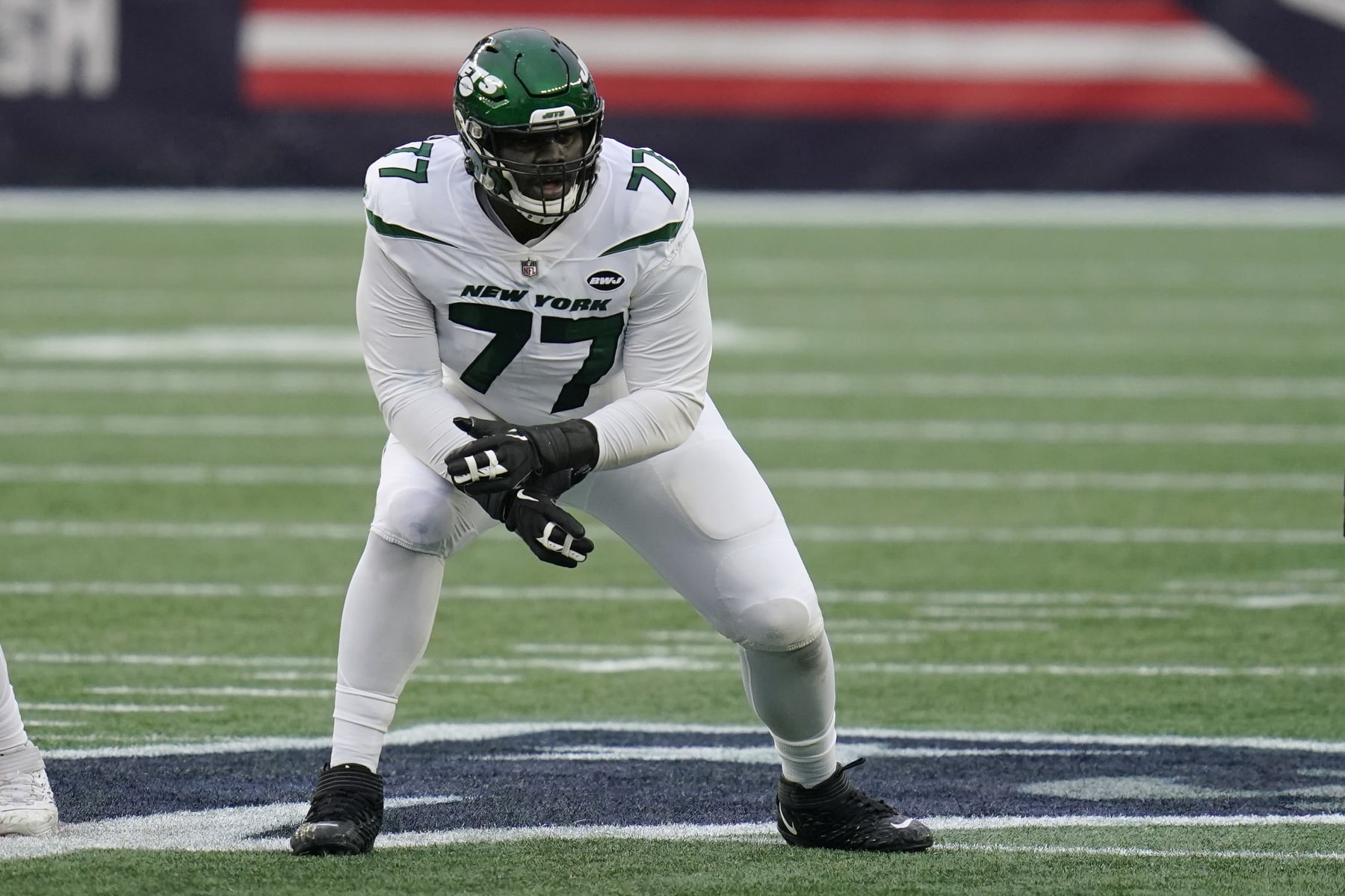 New York Jets offensive tackle Mekhi Becton protects the line in the first half of an NFL football game against the New England Patriots, Sunday, Jan. 3, 2021, in Foxborough, Mass. (AP Photo/Charles Krupa)