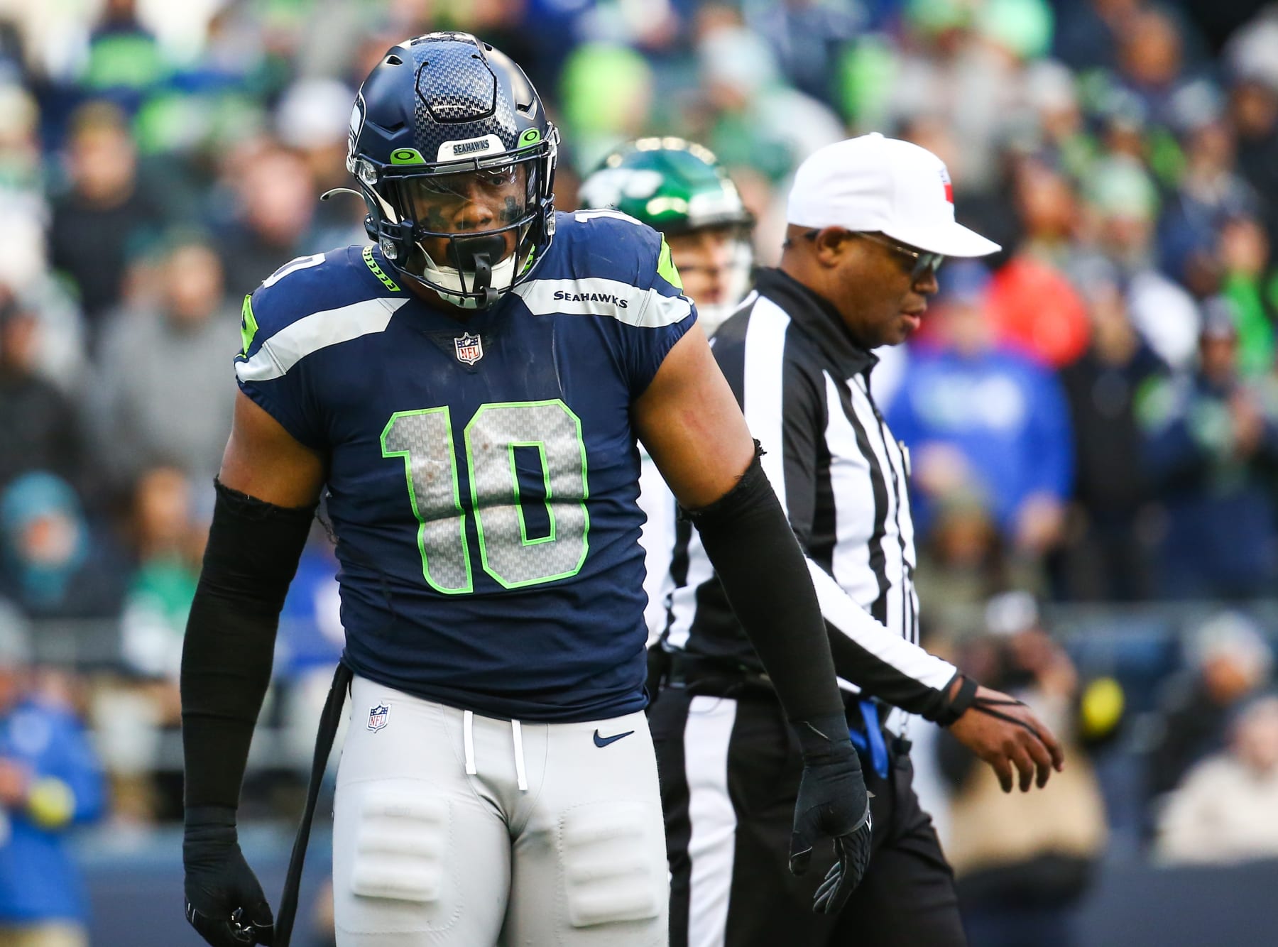 SEATTLE, WA - JANUARY 01:  Uchenna Nwosu #10 of the Seattle Seahawks walks on the field in between plays against the New York Jets during the second half of the game at Lumen Field on January 1, 2023 in Seattle, Washington. The Seahawks won 23-6.  (Photo by Lindsey Wasson/Getty Images)