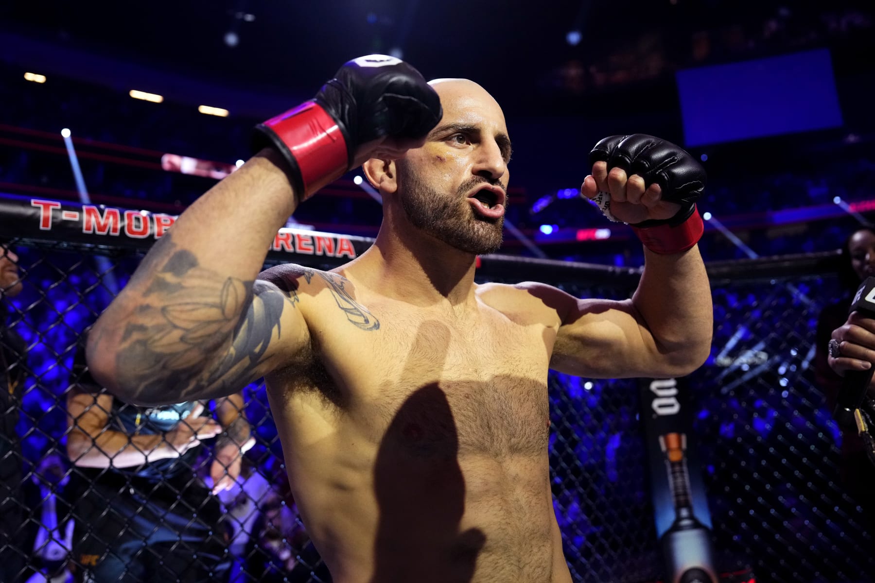LAS VEGAS, NEVADA - JULY 08: Alexander Volkanovski of Australia enters the Octagon in the UFC featherweight championship fight during the UFC 290 event at T-Mobile Arena on July 08, 2023 in Las Vegas, Nevada. (Photo by Jeff Bottari/Zuffa LLC via Getty Images)