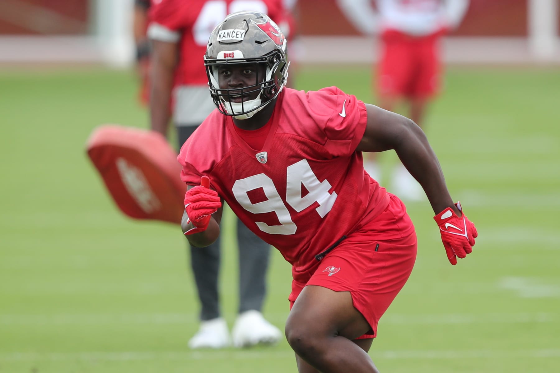 TAMPA, FL - MAY 13: Tampa Bay Buccaneers Defensive Lineman Calijah Kancey (94) goes thru a drill during the Tampa Bay Buccaneers Rookie Minicamp on May 13, 2023 at the AdventHealth Training Center at One Buccaneer Place in Tampa, Florida. (Photo by Cliff Welch/Icon Sportswire via Getty Images)