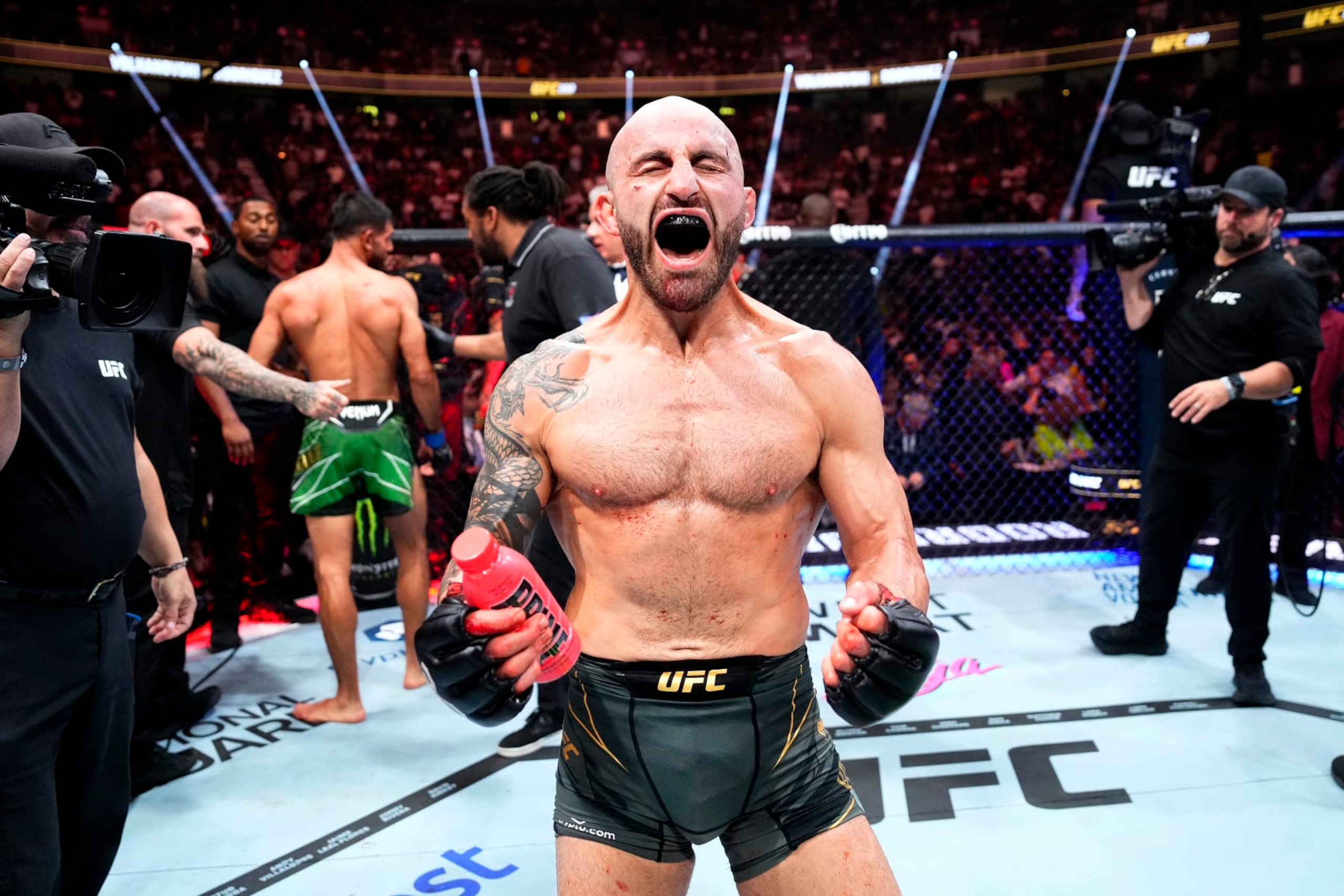 LAS VEGAS, NEVADA - JULY 08: Alexander Volkanovski of Australia reacts to his win over Yair Rodriguez of Mexico in the UFC featherweight championship fight during the UFC 290 event at T-Mobile Arena on July 08, 2023 in Las Vegas, Nevada. (Photo by Jeff Bottari/Zuffa LLC via Getty Images)
