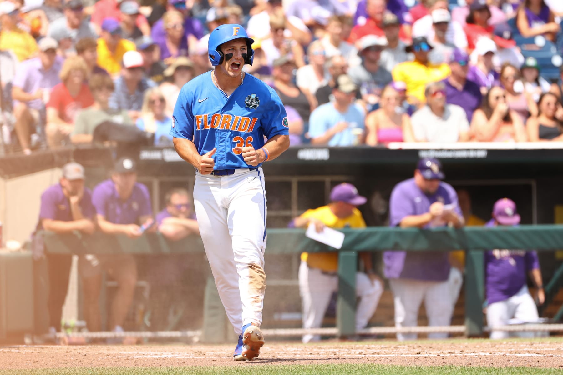 OMAHA, NE - JUNE 25: Wyatt Langford #36 of the Florida Gators scores a run against the LSU Tigers during game two of the Division I Men's Baseball Championship held at Charles Schwab Field on June 25, 2023 in Omaha, Nebraska. (Photo by Jamie Schwaberow/NCAA Photos via Getty Images)