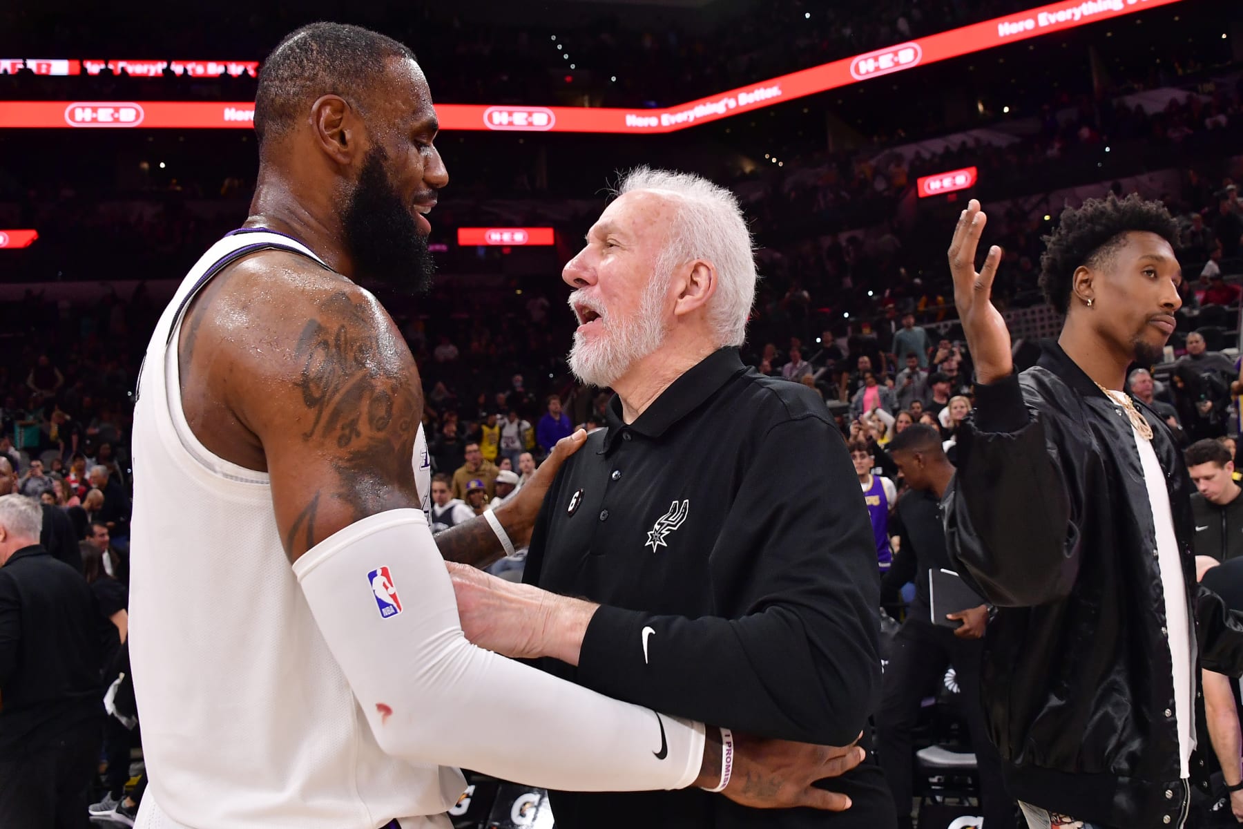 SAN ANTONIO, TX - NOVEMBER 26: LeBron James #6 of the Los Angeles Lakers and Head Coach Gregg Popovich of the San Antonio Spurs after the game on November 26, 2022 at the AT&T Center in San Antonio, Texas. NOTE TO USER: User expressly acknowledges and agrees that, by downloading and or using this photograph, user is consenting to the terms and conditions of the Getty Images License Agreement. Mandatory Copyright Notice: Copyright 2022 NBAE (Photos by Michael Gonzales/NBAE via Getty Images)