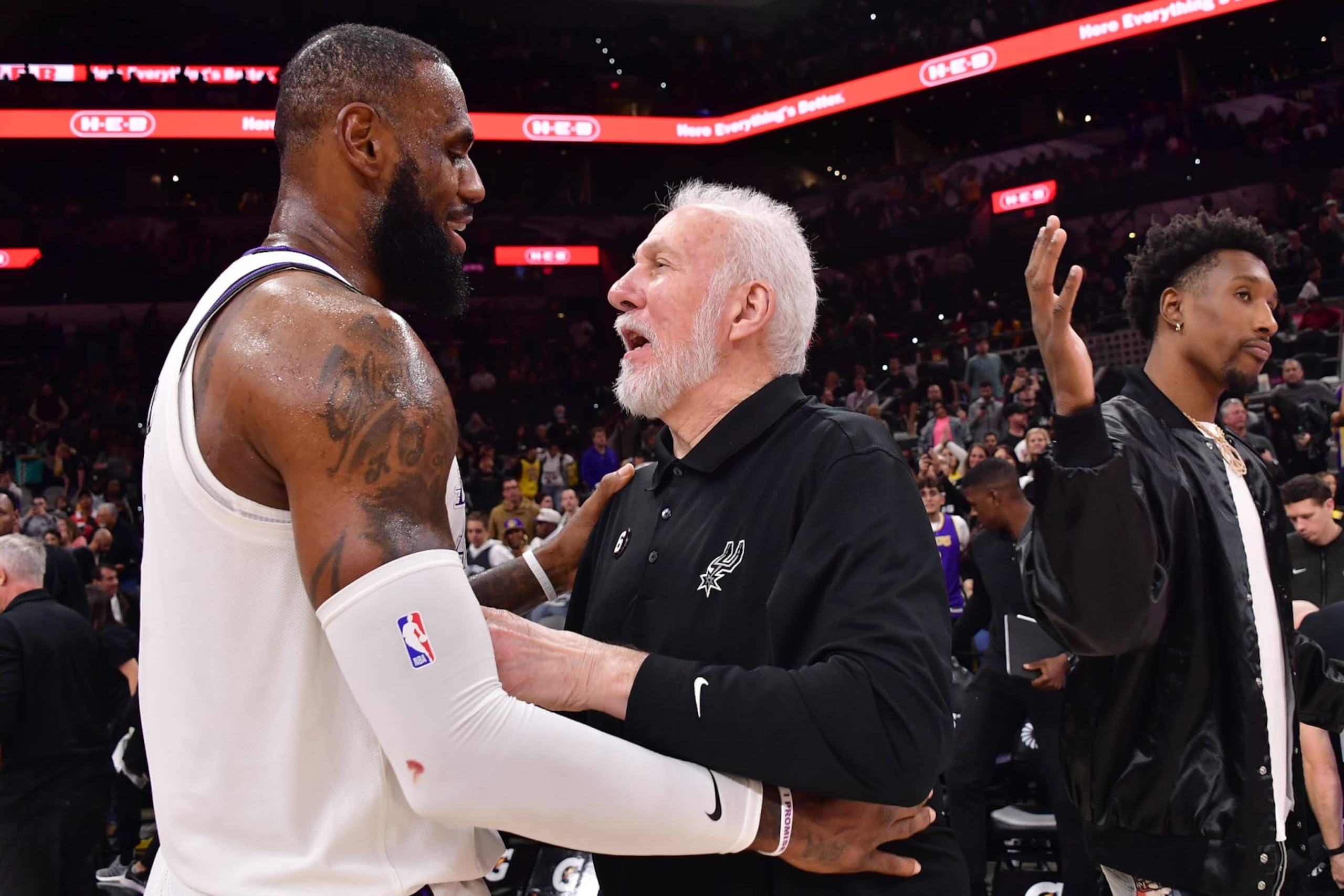 SAN ANTONIO, TX - NOVEMBER 26: LeBron James #6 of the Los Angeles Lakers and Head Coach Gregg Popovich of the San Antonio Spurs after the game on November 26, 2022 at the AT&T Center in San Antonio, Texas. NOTE TO USER: User expressly acknowledges and agrees that, by downloading and or using this photograph, user is consenting to the terms and conditions of the Getty Images License Agreement. Mandatory Copyright Notice: Copyright 2022 NBAE (Photos by Michael Gonzales/NBAE via Getty Images)