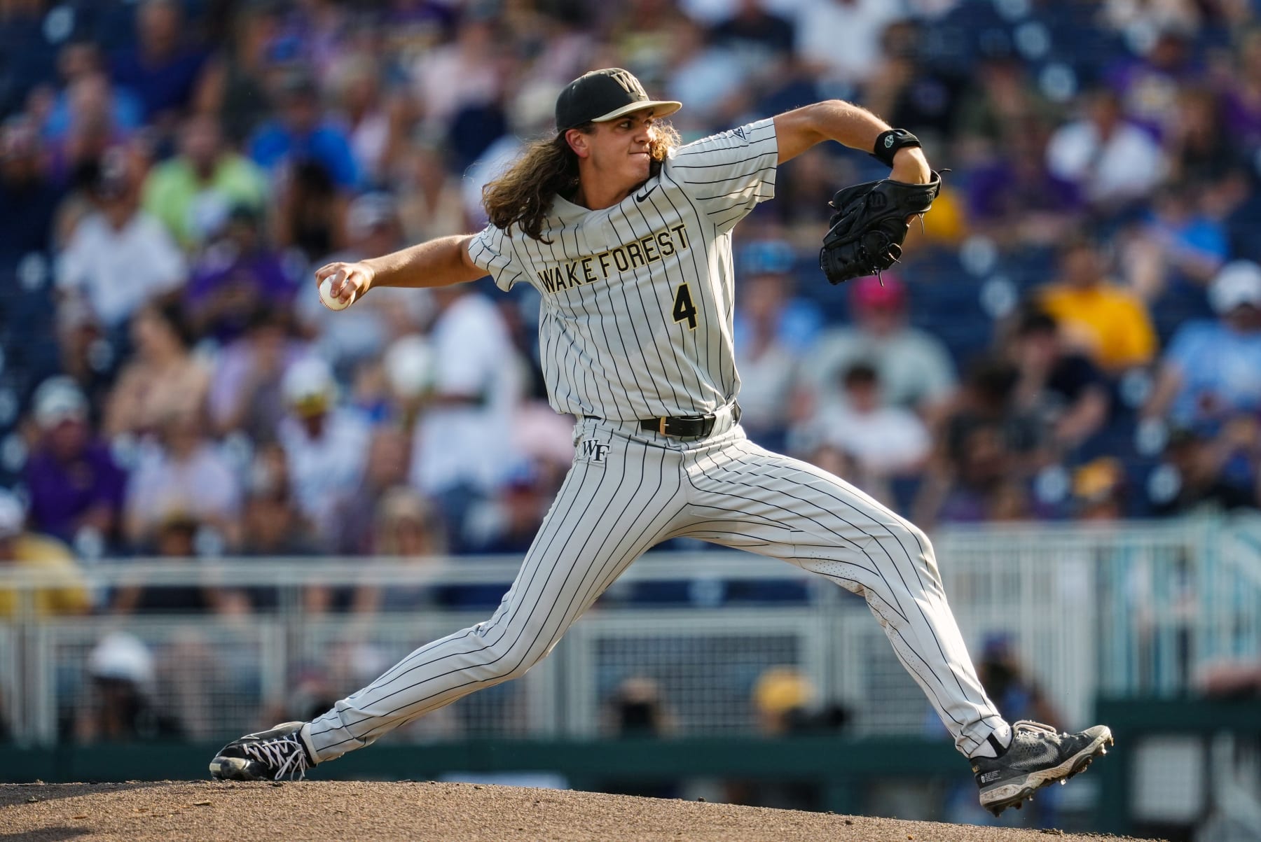 OMAHA, NEBRASKA - JUNE 22: Rhett Lowder #4 of the Wake Forest pitches during the first inning against the LSU at Charles Schwab Field on June 22, 2023 in Omaha, Nebraska. (Photo by Jay Biggerstaff/Getty Images)
