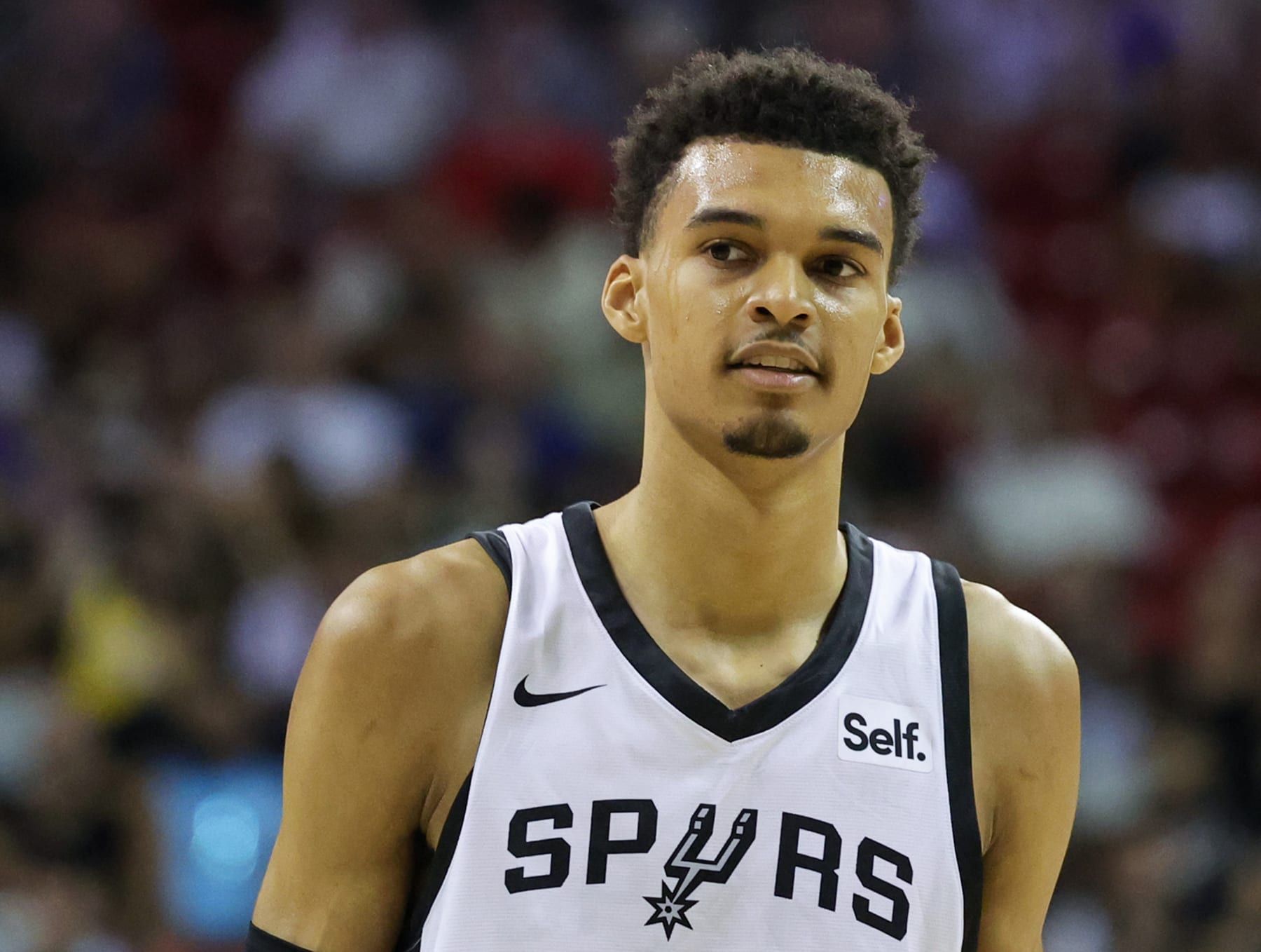 LAS VEGAS, NEVADA - JULY 07: Victor Wembanyama #1 of the San Antonio Spurs walks on the court in the second half of a 2023 NBA Summer League game against the Charlotte Hornets at the Thomas & Mack Center on July 07, 2023 in Las Vegas, Nevada. NOTE TO USER: User expressly acknowledges and agrees that, by downloading and or using this photograph, User is consenting to the terms and conditions of the Getty Images License Agreement. (Photo by Ethan Miller/Getty Images)