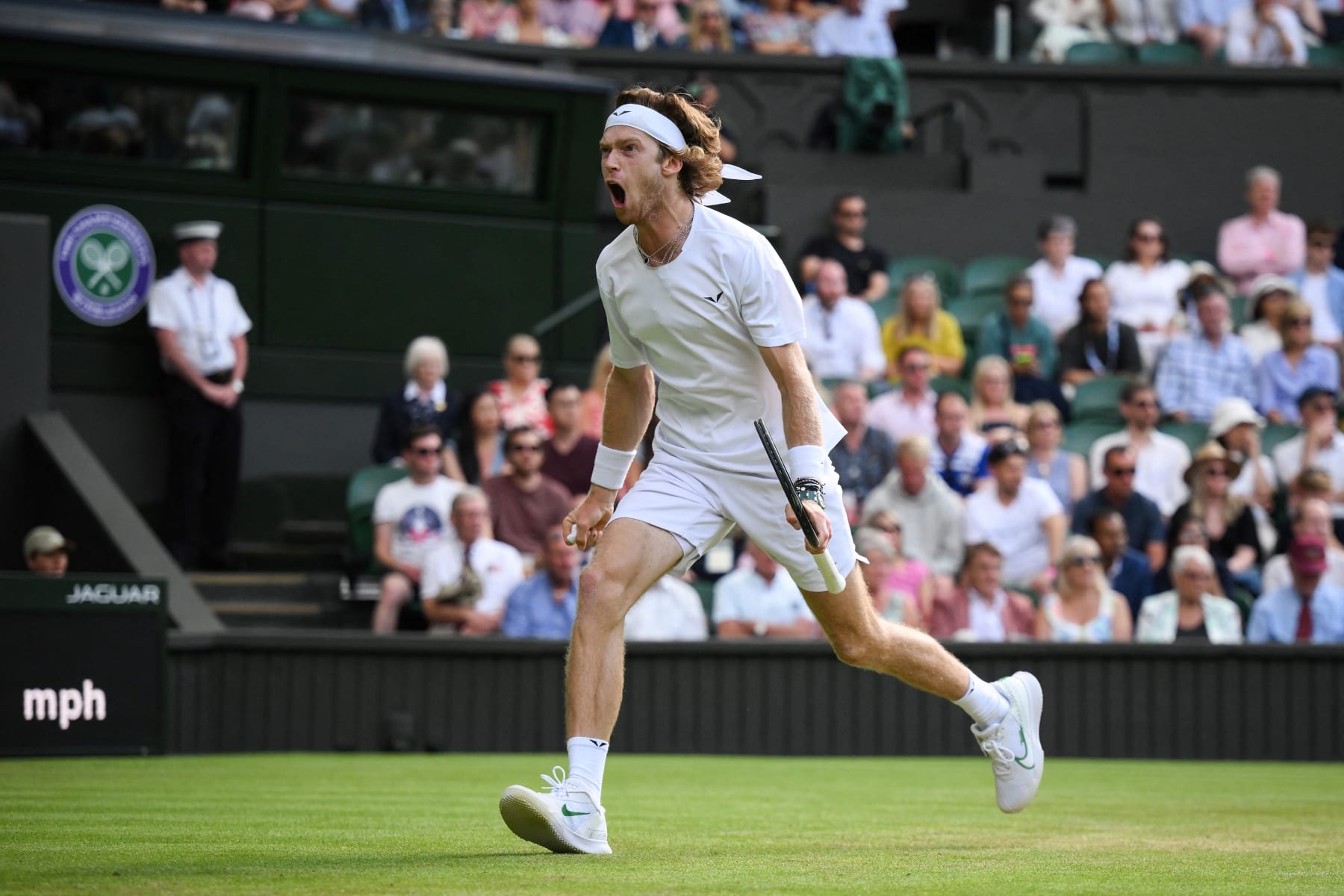 TOPSHOT - Russia's Andrey Rublev celebrates winning a point against Kazakhstan's Alexander Bublik during their men's singles tennis match on the seventh day of the 2023 Wimbledon Championships at The All England Tennis Club in Wimbledon, southwest London, on July 9, 2023. (Photo by Daniel LEAL / AFP) / RESTRICTED TO EDITORIAL USE (Photo by DANIEL LEAL/AFP via Getty Images) TOPSHOT - Russia's Andrey Rublev celebrates winning a point against Kazakhstan's Alexander Bublik during their men's singles tennis match on the seventh day of the 2023 Wimbledon Championships at The All England Tennis Club in Wimbledon, southwest London, on July 9, 2023. (Photo by Daniel LEAL / AFP) / RESTRICTED TO EDITORIAL USE (Photo by DANIEL LEAL/AFP via Getty Images)