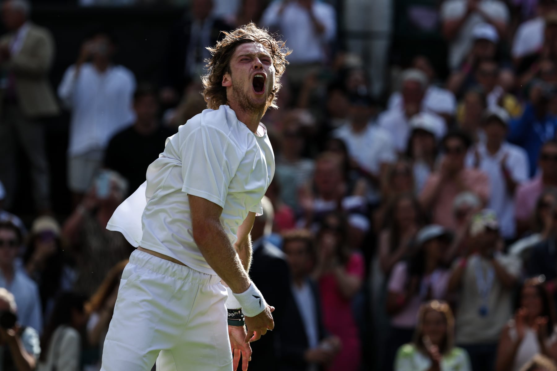 LONDON, ENGLAND - JULY 09: Andrey Rublev celebrates the victory in the Men's Singles fourth round match against Alexander Bublik of Kazakhstan during day seven of The Championships Wimbledon 2023 at All England Lawn Tennis and Croquet Club on July 09, 2023 in London, England. (Photo by Shi Tang/Getty Images) LONDON, ENGLAND - JULY 09: Andrey Rublev celebrates the victory in the Men's Singles fourth round match against Alexander Bublik of Kazakhstan during day seven of The Championships Wimbledon 2023 at All England Lawn Tennis and Croquet Club on July 09, 2023 in London, England. (Photo by Shi Tang/Getty Images)