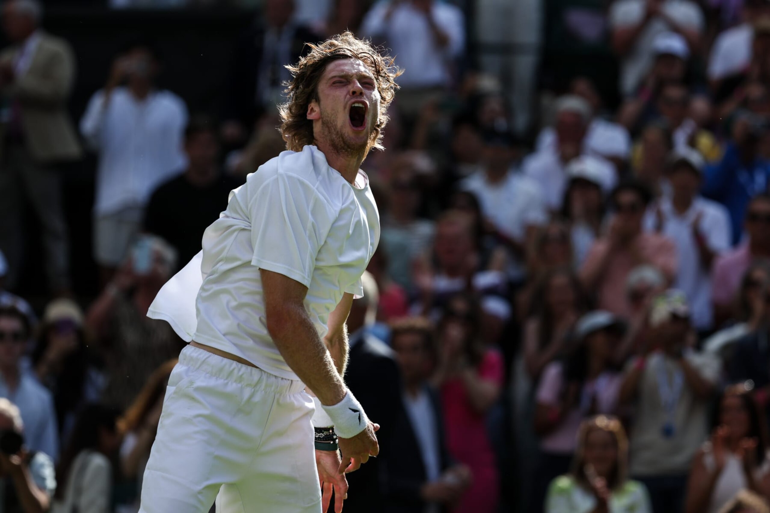 LONDON, ENGLAND - JULY 09: Andrey Rublev celebrates the victory in the Men's Singles fourth round match against Alexander Bublik of Kazakhstan during day seven of The Championships Wimbledon 2023 at All England Lawn Tennis and Croquet Club on July 09, 2023 in London, England. (Photo by Shi Tang/Getty Images)