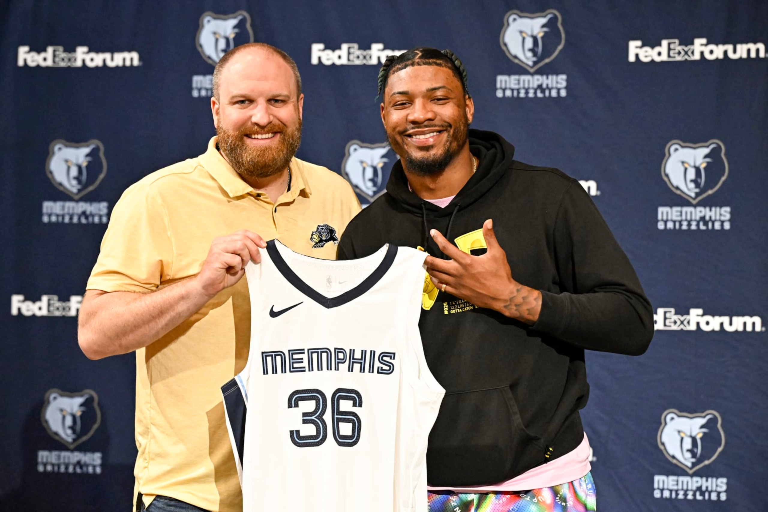 Taylor Jenkins and Marcus Smart