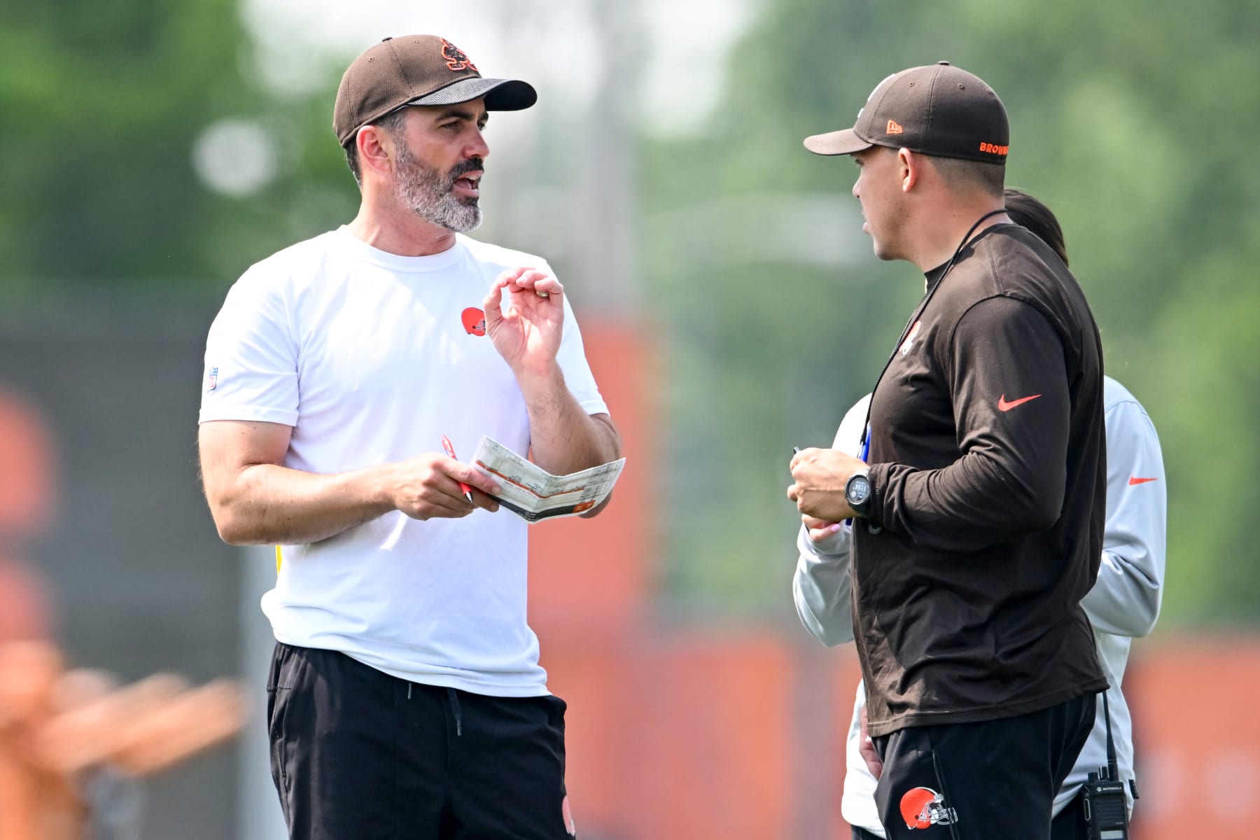 BEREA, OHIO - JUNE 07: Head coach Kevin Stefanski of the Cleveland Browns talks with assistant head coach/special teams coordinator Bubba Ventrone during the Cleveland Browns mandatory veteran minicamp at CrossCountry Mortgage Campus on June 07, 2023 in Berea, Ohio. (Photo by Nick Cammett/Diamond Images via Getty Images)