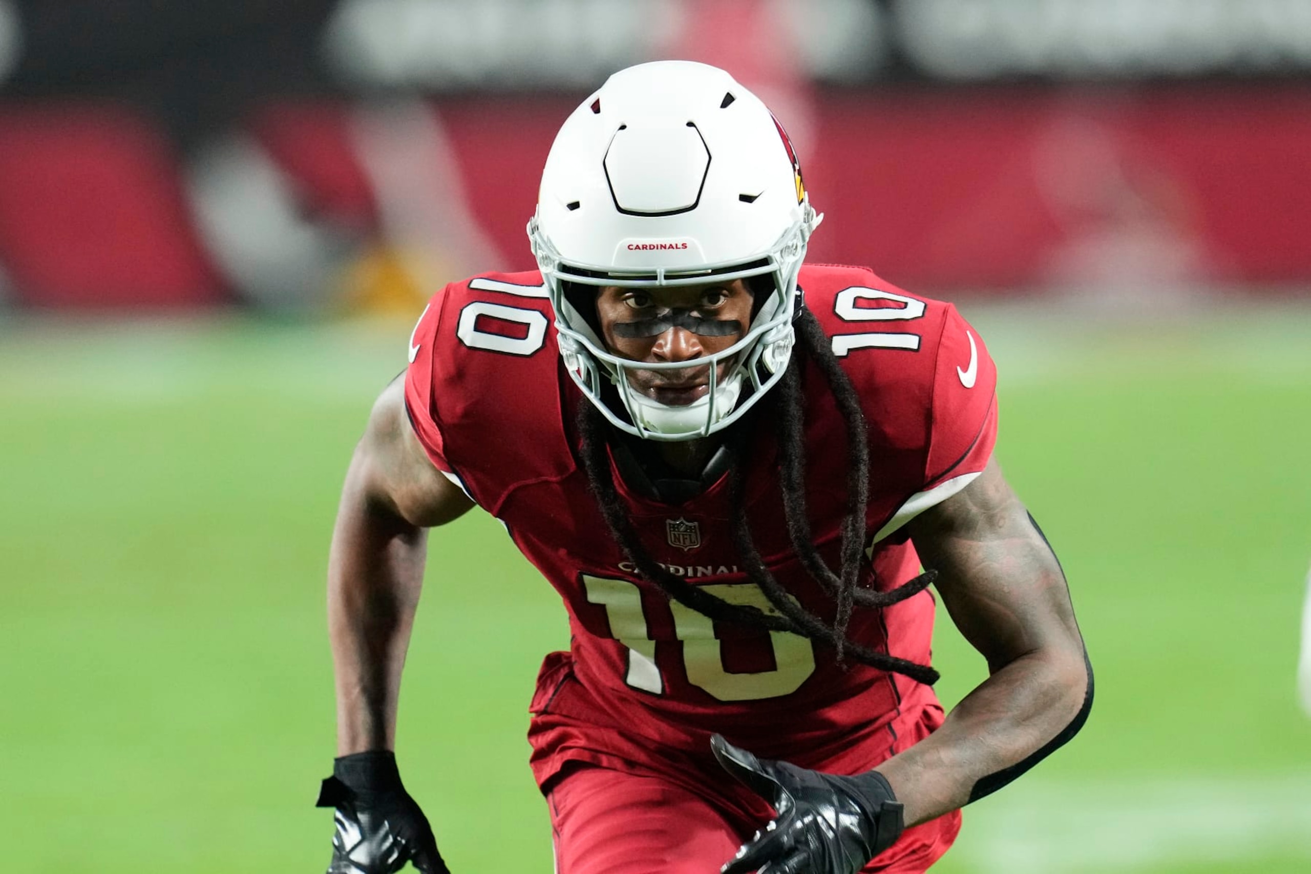 Arizona Cardinals wide receiver DeAndre Hopkins runs down field against the New England Patriots during the first half of an NFL football game in Glendale, Ariz., Monday, Dec. 12, 2022. (AP Photo/Ross D. Franklin) Arizona Cardinals wide receiver DeAndre Hopkins runs down field against the New England Patriots during the first half of an NFL football game in Glendale, Ariz., Monday, Dec. 12, 2022. (AP Photo/Ross D. Franklin)