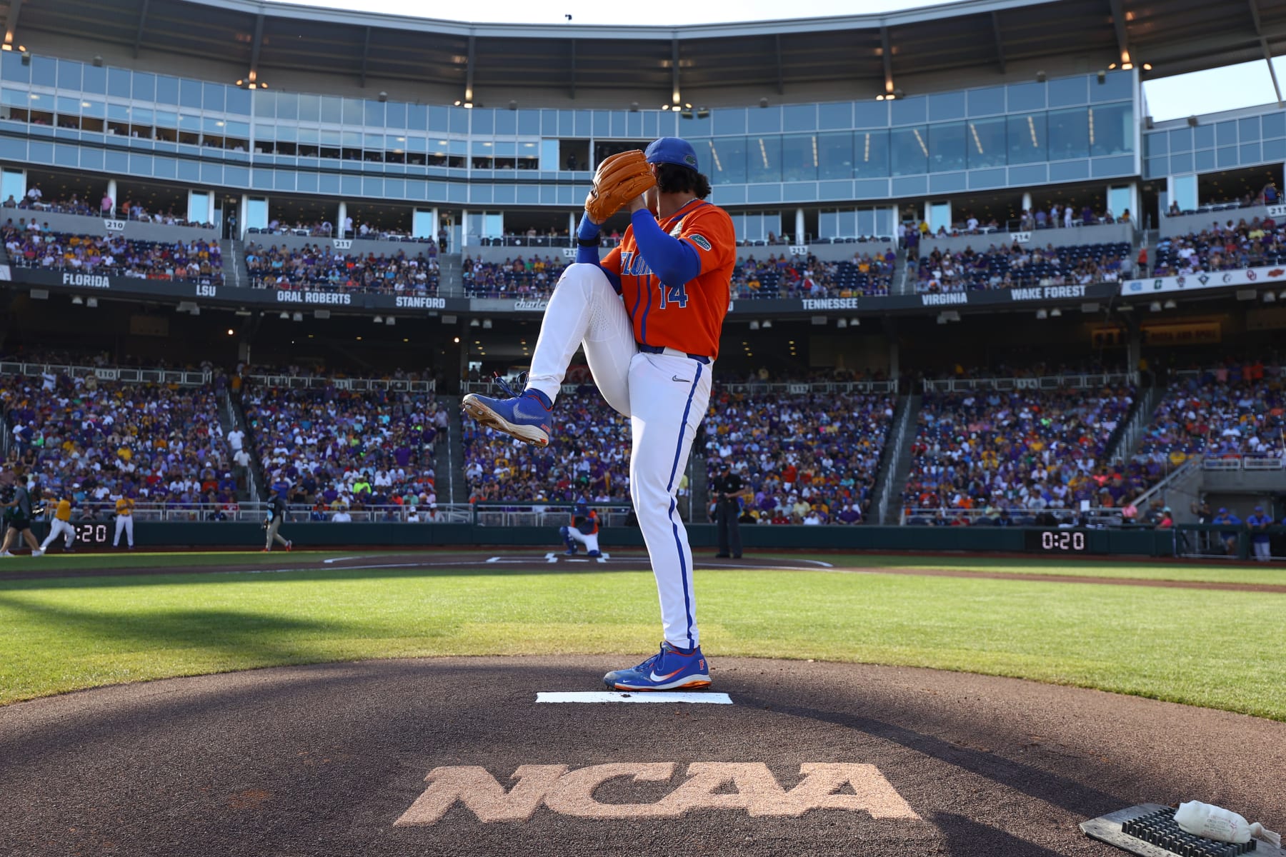 OMAHA, NE - JUNE 26: Jac Caglianone #14 of the Florida Gators warms up before taking on the LSU Tigers in game three of the Division I Men's Baseball Championship held at Charles Schwab Field on June 26, 2023 in Omaha, Nebraska. (Photo by Jamie Schwaberow/NCAA Photos via Getty Images)
