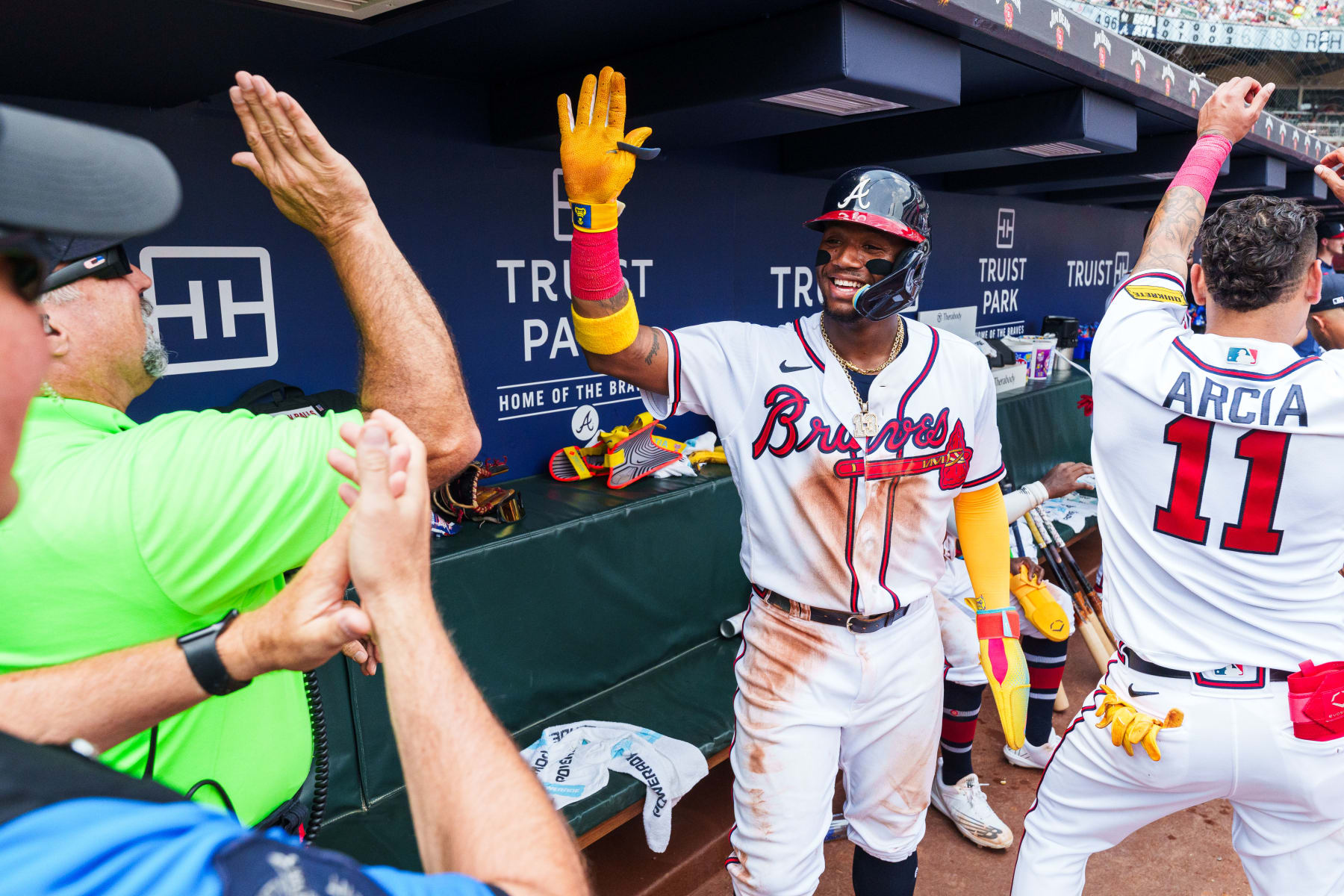 ATLANTA, GA - JULY 2: Ronald Acuña Jr. #13 of the Atlanta Braves celebrates after scoring in the fifth inning against the Miami Marlins at Truist Park on July 2, 2023 in Atlanta, Georgia. (Photo by Matthew Grimes Jr./Atlanta Braves/Getty Images)