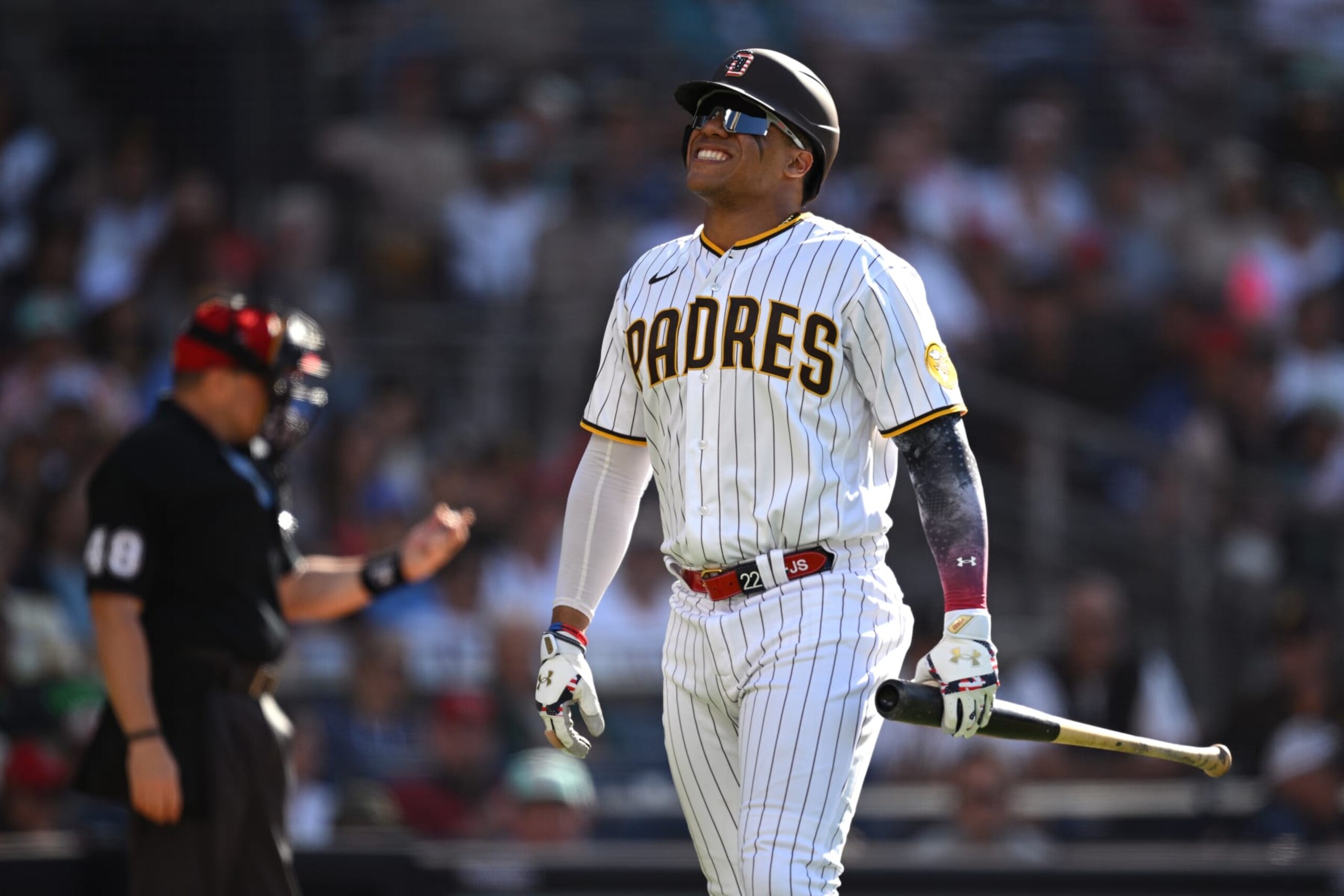 SAN DIEGO, CALIFORNIA - JULY 04: Juan Soto #22 of the San Diego Padres reacts after striking out during the fifth inning against the Los Angeles Angels at PETCO Park on July 04, 2023 in San Diego, California. (Photo by Orlando Ramirez/Getty Images)