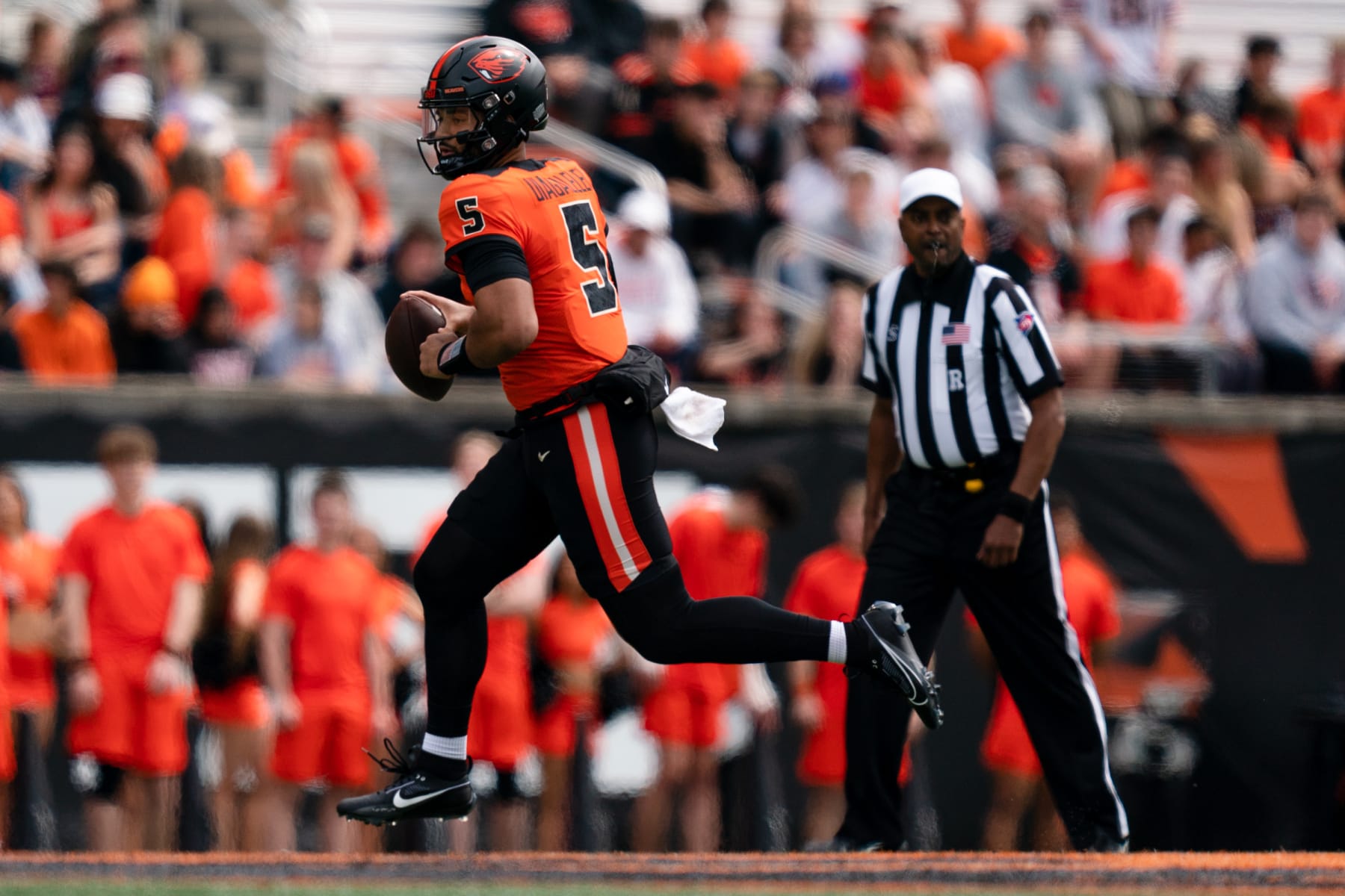 CORVALLIS, OR - APRIL 22:  Quarterback DJ Uiagalelei #5 of the Oregon State Beavers runs the ball out wide during the Oregon State Spring Football Game at Reser Stadium on April 22, 2023 in Corvallis, Oregon. (Photo by Ali Gradischer/Getty Images)