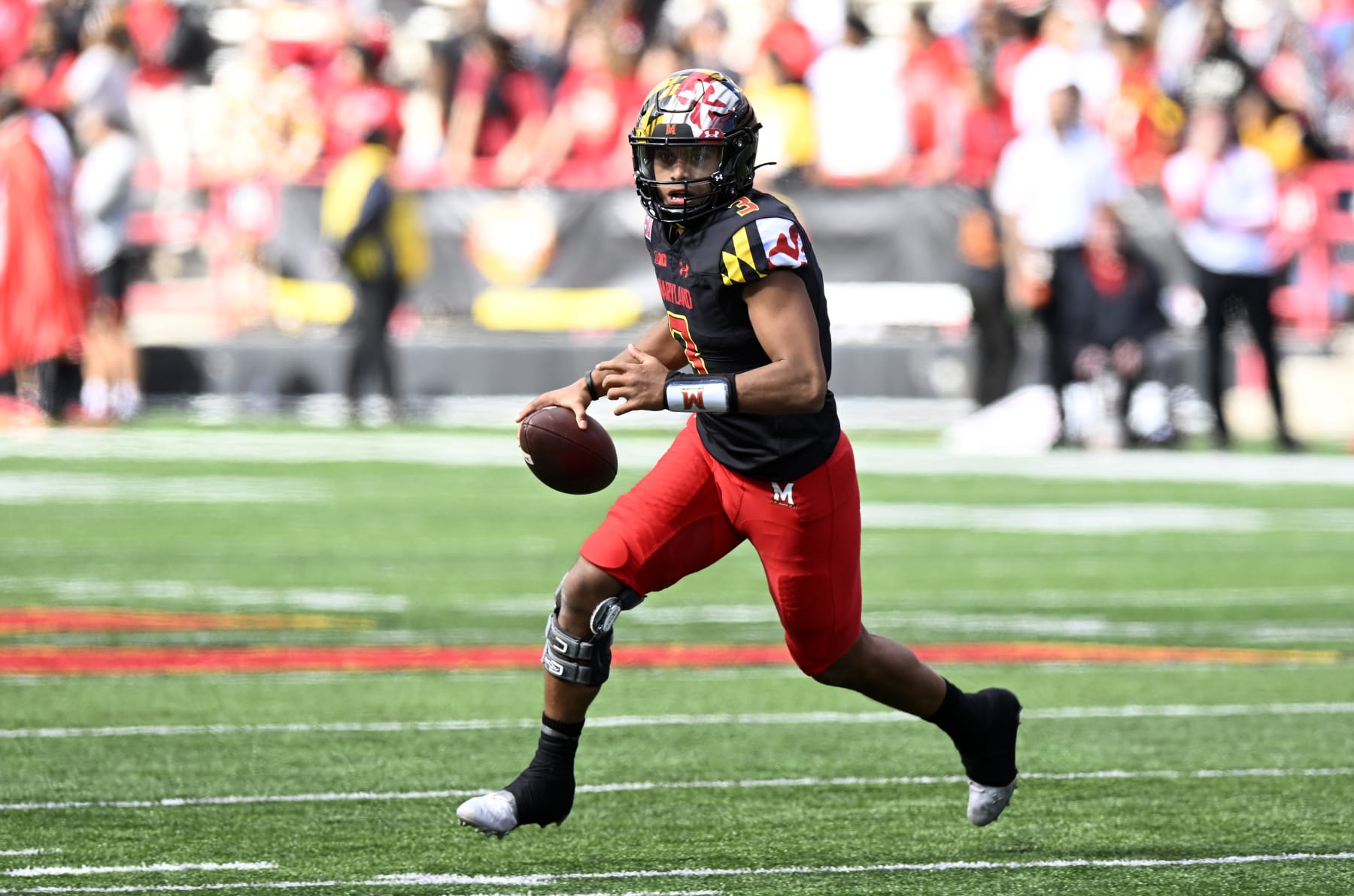 COLLEGE PARK, MARYLAND - OCTOBER 08: Taulia Tagovailoa #3 of the Maryland Terrapins rolls out of the pocket against the Purdue Boilermakers at SECU Stadium on October 08, 2022 in College Park, Maryland. (Photo by G Fiume/Getty Images)