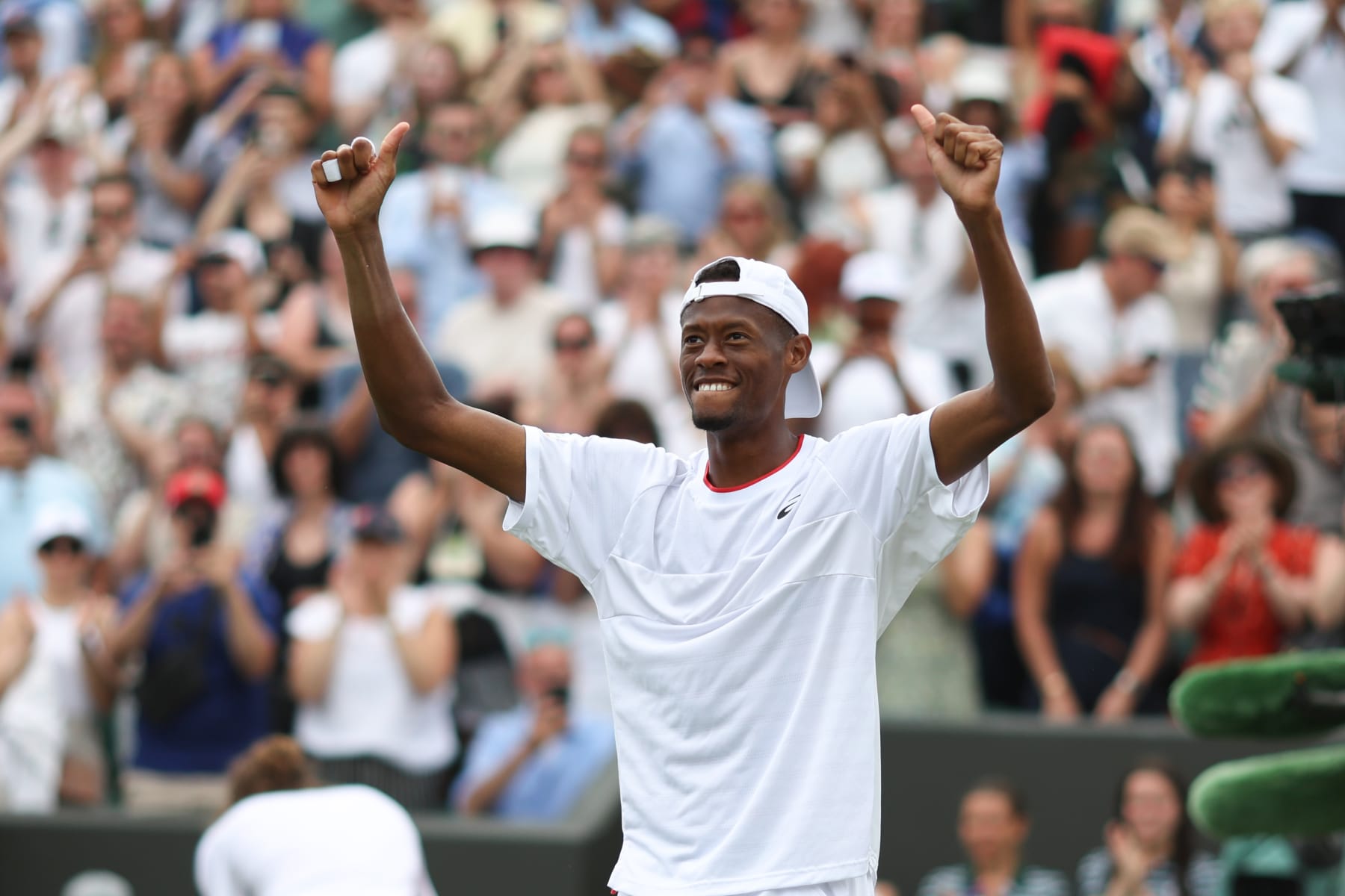LONDON, ENGLAND - JULY 10: Christopher Eubanks (USA) celebrates during his Gentlemen's Singles Round of 16 match against Stefanos Tsitsipas (GRC) during day eight of The Championships Wimbledon 2023 at All England Lawn Tennis and Croquet Club on July 10, 2023 in London, England. (Photo by Charlotte Wilson/Offside/Offside via Getty Images)