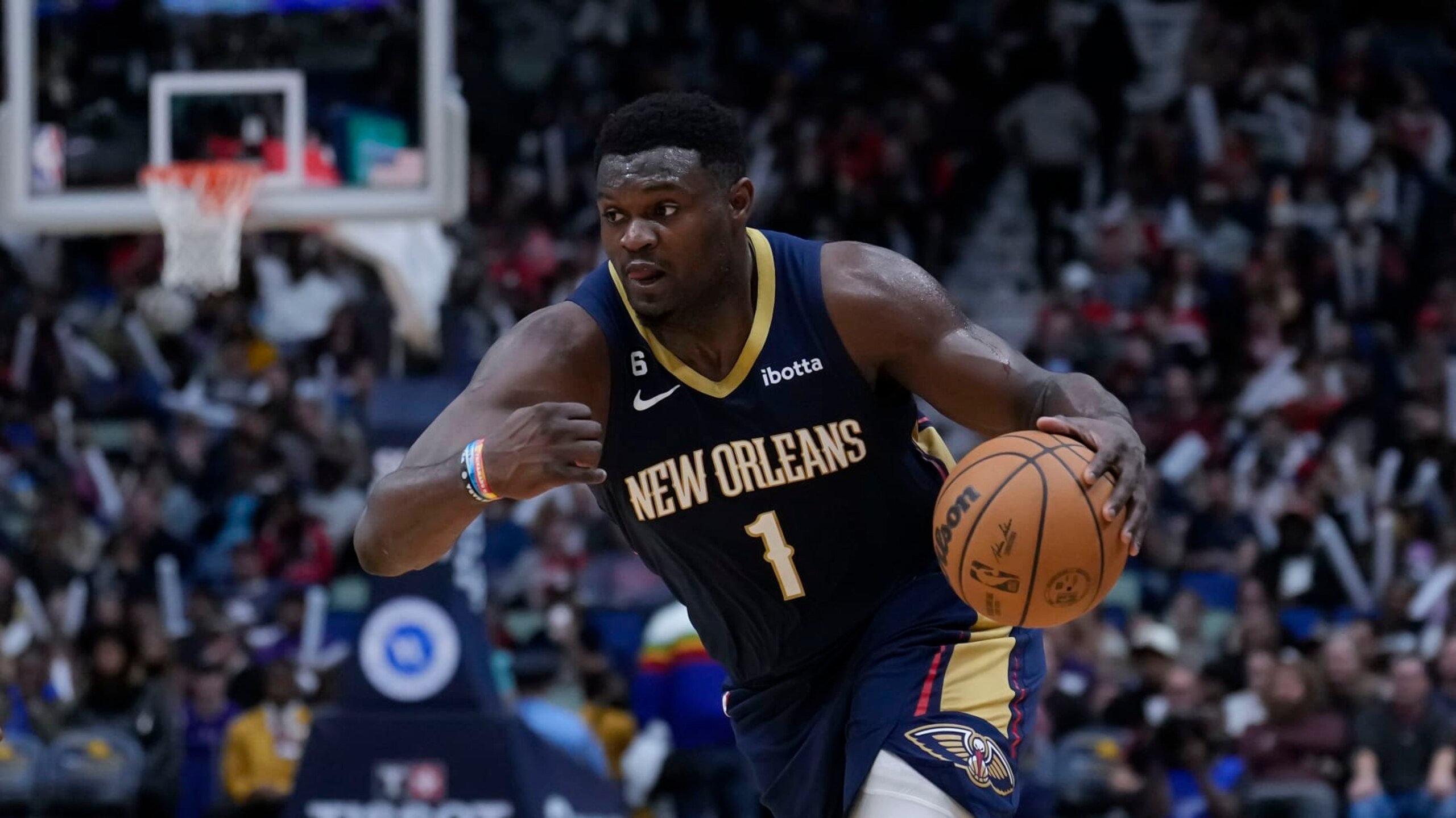 New Orleans Pelicans forward Zion Williamson (1) moves the ball down court in the second half of an NBA basketball game against the Minnesota Timberwolves in New Orleans, Wednesday, Dec. 28, 2022. The Pelicans won 119-118. (AP Photo/Gerald Herbert)