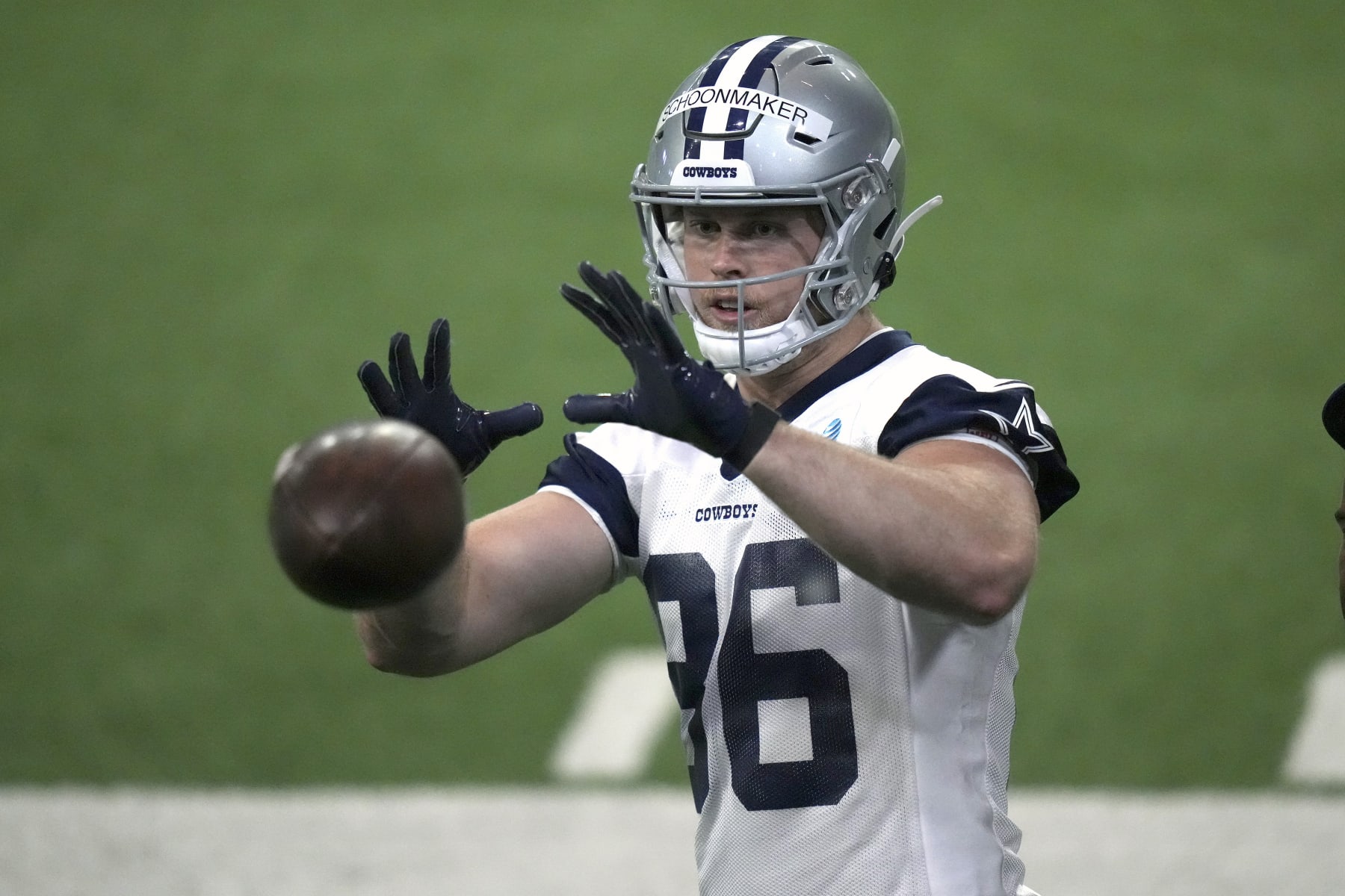 Dallas Cowboys tight end Luke Schoonmaker catches a ball during NFL football practice in Frisco, Texas, Thursday, June 1, 2023. (AP Photo/LM Otero)