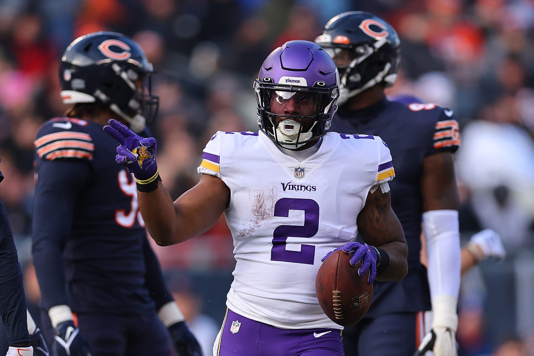 CHICAGO, ILLINOIS - JANUARY 08: Alexander Mattison #2 of the Minnesota Vikings celebrates a first down against the Chicago Bears at Soldier Field on January 08, 2023 in Chicago, Illinois. (Photo by Michael Reaves/Getty Images)