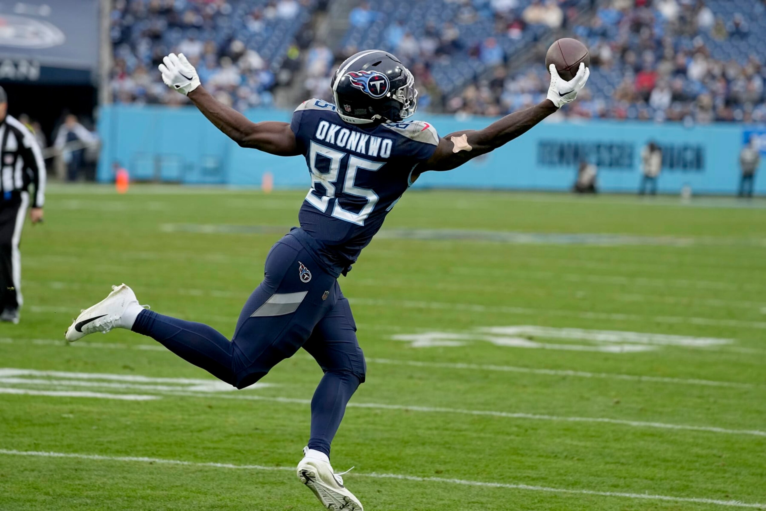 Tennessee Titans tight end Chigoziem Okonkwo catches a pass for a successful 2-point conversion during the second half of an NFL football game against the Jacksonville Jaguars Sunday, Dec. 11, 2022, in Nashville, Tenn. (AP Photo/Chris Carlson)