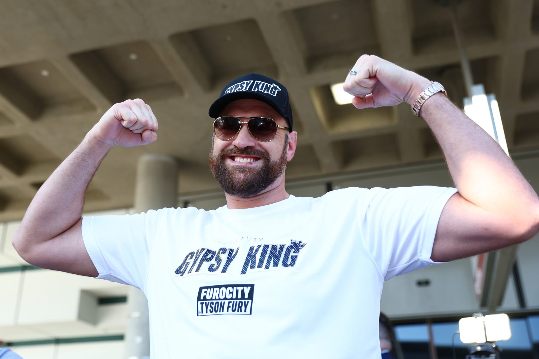 BRISBANE, AUSTRALIA - MAY 25: Tyson Fury speaks to the media at Brisbane Domestic Airport on May 25, 2023 in Brisbane, Australia. (Photo by Chris Hyde/Getty Images)