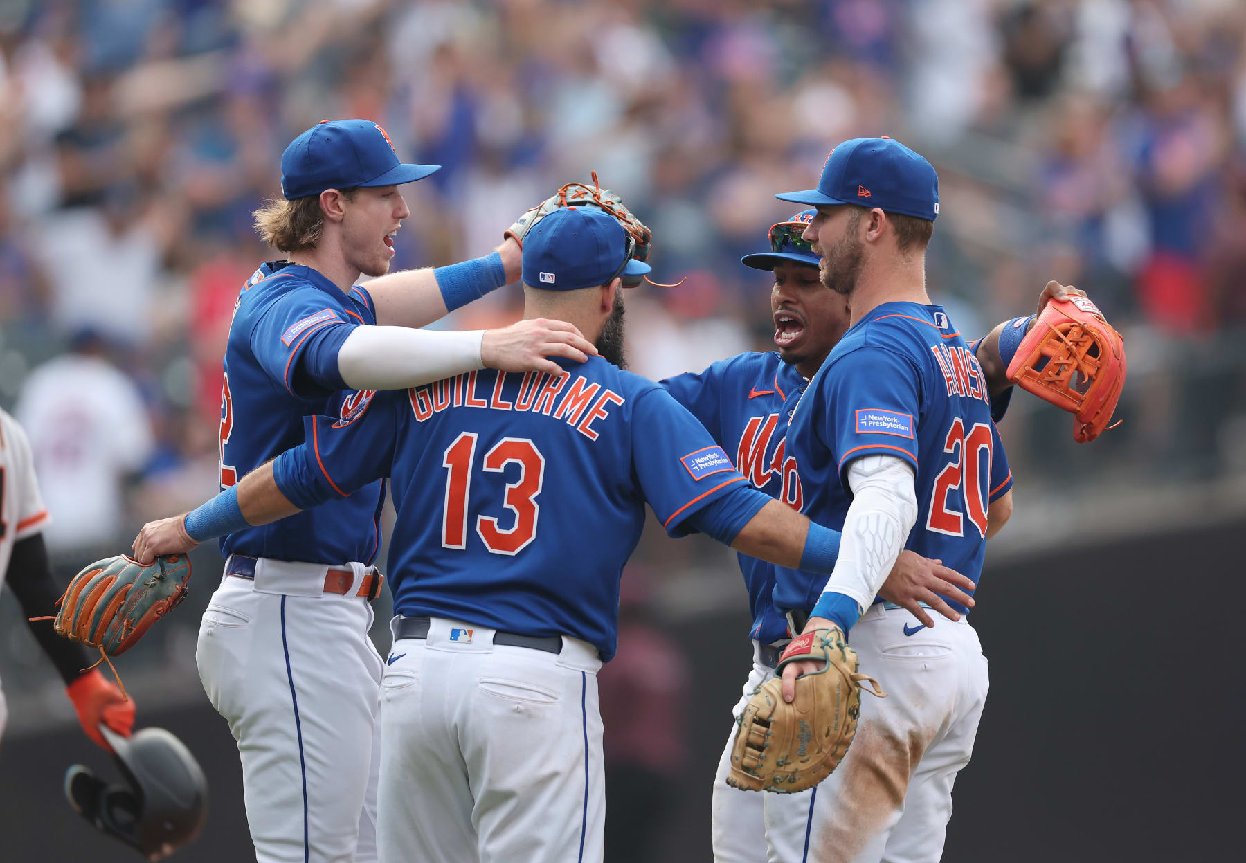 NEW YORK, NEW YORK - JULY 01:  Brett Baty #22, Luis Guillorme #13, Francisco Lindor #12, and Pete Alonso #20 of the New York Mets celebrate a 4-1 win against the San Francisco Giants during their game at Citi Field on July 01, 2023 in the Queens borough of New York City. (Photo by Al Bello/Getty Images)