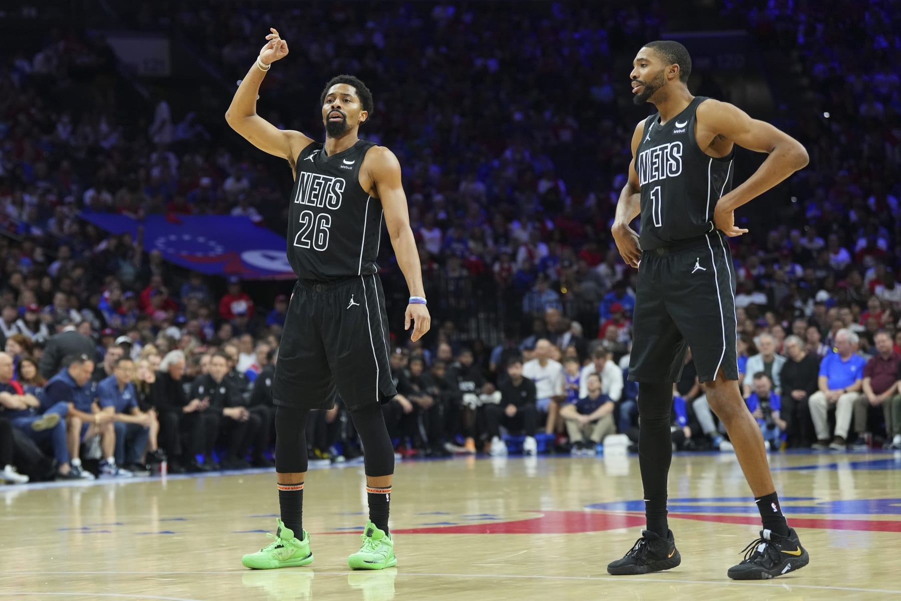 PHILADELPHIA, PA - APRIL 15: Spencer Dinwiddie #26 and Mikal Bridges #1 of the Brooklyn Nets look on against the Philadelphia 76ers during Game One of the Eastern Conference First Round Playoffs at the Wells Fargo Center on April 15, 2023 in Philadelphia, Pennsylvania. The 76ers defeated the Nets 121-101. NOTE TO USER: User expressly acknowledges and agrees that, by downloading and or using this photograph, User is consenting to the terms and conditions of the Getty Images License Agreement. (Photo by Mitchell Leff/Getty Images)