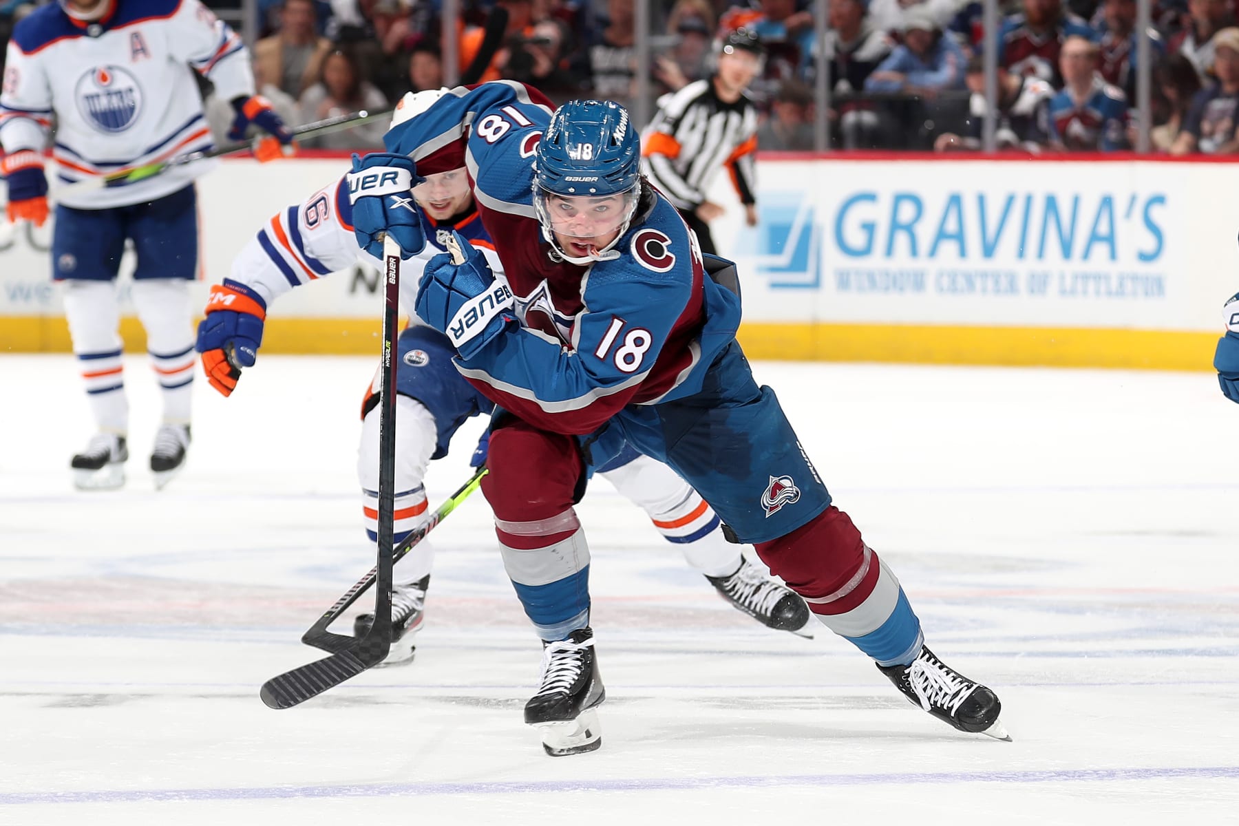DENVER, COLORADO - APRIL 11: Alex Newhook #18 of the Colorado Avalanche skates against the Edmonton Oilers at Ball Arena on April 11, 2023 in Denver, Colorado. (Photo by Michael Martin/NHLI via Getty Images)