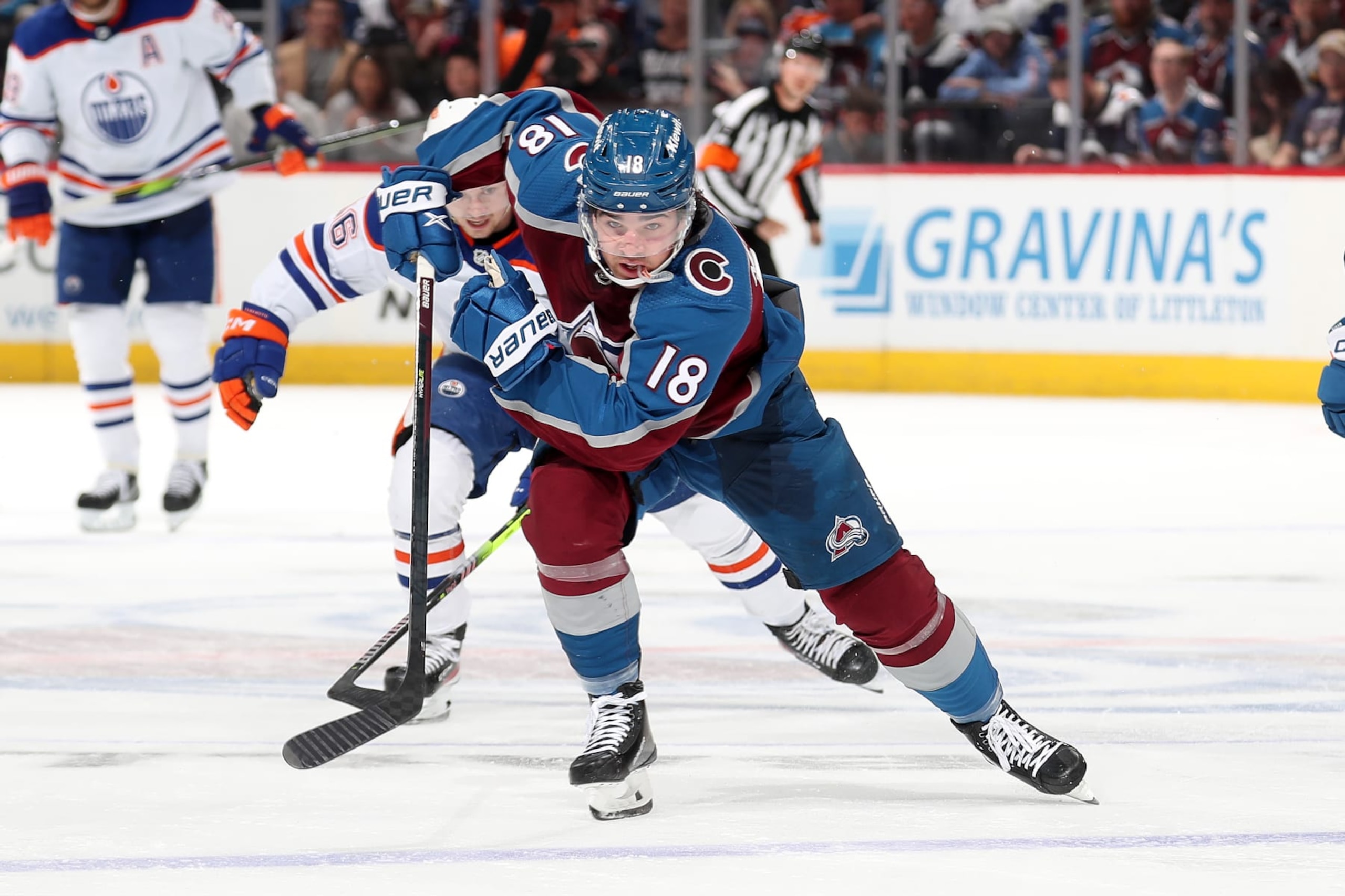 DENVER, COLORADO - APRIL 11: Alex Newhook #18 of the Colorado Avalanche skates against the Edmonton Oilers at Ball Arena on April 11, 2023 in Denver, Colorado. (Photo by Michael Martin/NHLI via Getty Images)