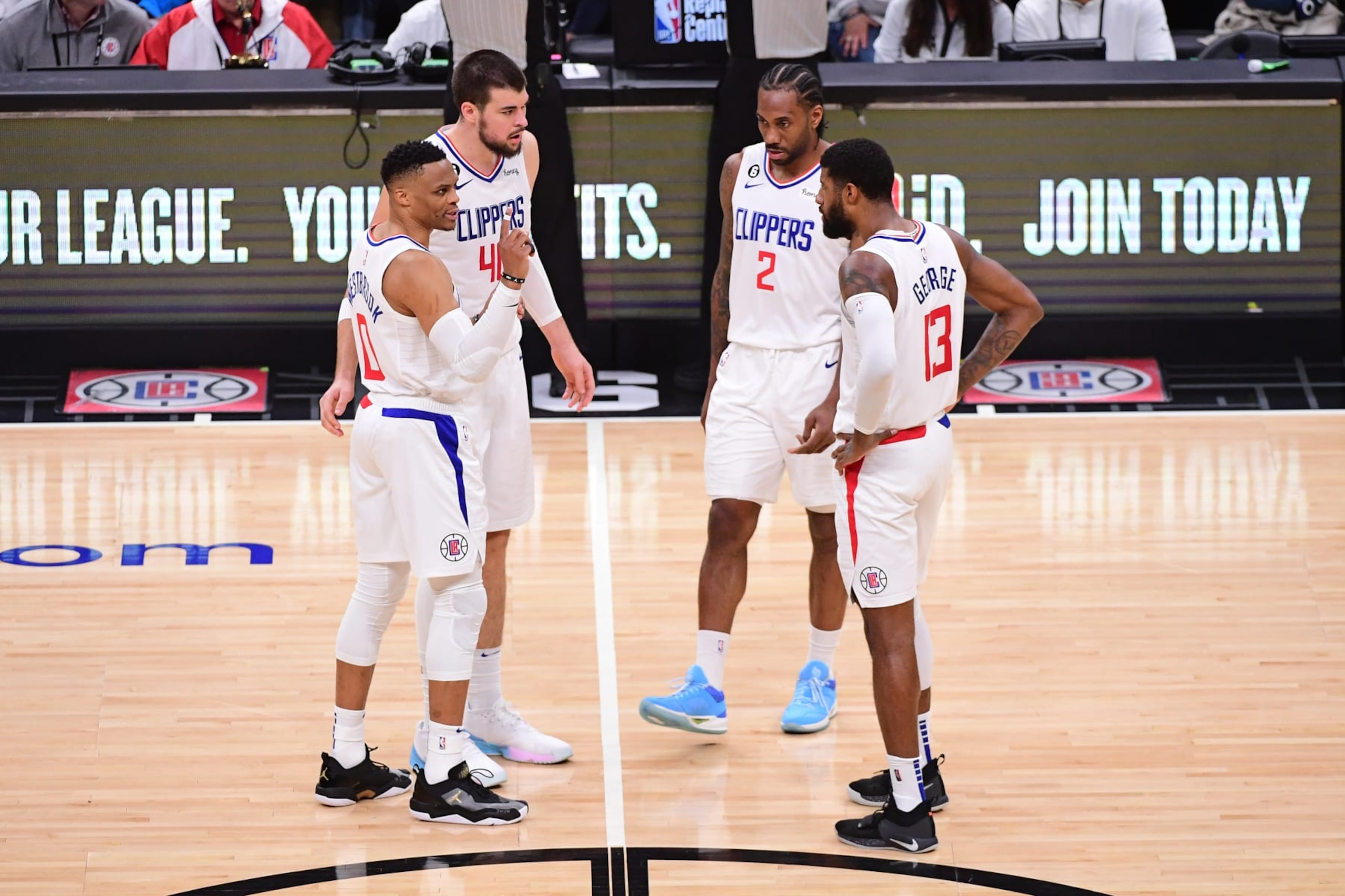 LOS ANGELES, CA - MARCH 5: Russell Westbrook #0, Ivica Zubac #40, Kawhi Leonard #2 and Paul George #13 of the LA Clippers huddle up during the game against the Memphis Grizzlies on March 5, 2023 at Crypto.Com Arena in Los Angeles, California. NOTE TO USER: User expressly acknowledges and agrees that, by downloading and/or using this Photograph, user is consenting to the terms and conditions of the Getty Images License Agreement. Mandatory Copyright Notice: Copyright 2023 NBAE (Photo by Adam Pantozzi/NBAE via Getty Images) LOS ANGELES, CA - MARCH 5: Russell Westbrook #0, Ivica Zubac #40, Kawhi Leonard #2 and Paul George #13 of the LA Clippers huddle up during the game against the Memphis Grizzlies on March 5, 2023 at Crypto.Com Arena in Los Angeles, California. NOTE TO USER: User expressly acknowledges and agrees that, by downloading and/or using this Photograph, user is consenting to the terms and conditions of the Getty Images License Agreement. Mandatory Copyright Notice: Copyright 2023 NBAE (Photo by Adam Pantozzi/NBAE via Getty Images)