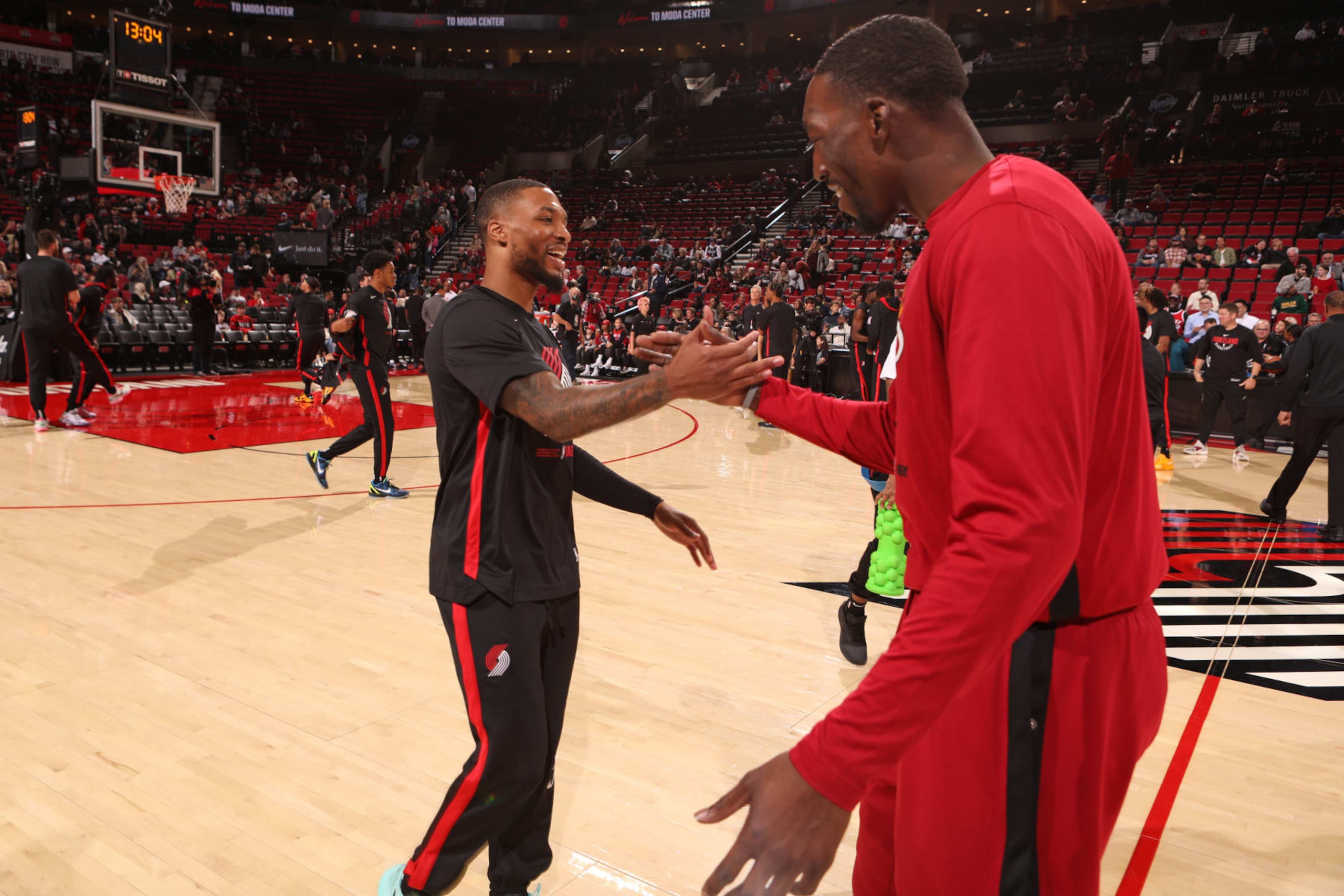 PORTLAND, OR - OCTOBER 26:Damian Lillard #0 of the Portland Trail Blazers and Bam Adebayo #13 of the Miami Heat shake hands on October 26, 2022 at the Moda Center Arena in Portland, Oregon. NOTE TO USER: User expressly acknowledges and agrees that, by downloading and or using this photograph, user is consenting to the terms and conditions of the Getty Images License Agreement. Mandatory Copyright Notice: Copyright 2022 NBAE (Photo by Cameron Browne/NBAE via Getty Images) PORTLAND, OR - OCTOBER 26:Damian Lillard #0 of the Portland Trail Blazers and Bam Adebayo #13 of the Miami Heat shake hands on October 26, 2022 at the Moda Center Arena in Portland, Oregon. NOTE TO USER: User expressly acknowledges and agrees that, by downloading and or using this photograph, user is consenting to the terms and conditions of the Getty Images License Agreement. Mandatory Copyright Notice: Copyright 2022 NBAE (Photo by Cameron Browne/NBAE via Getty Images)