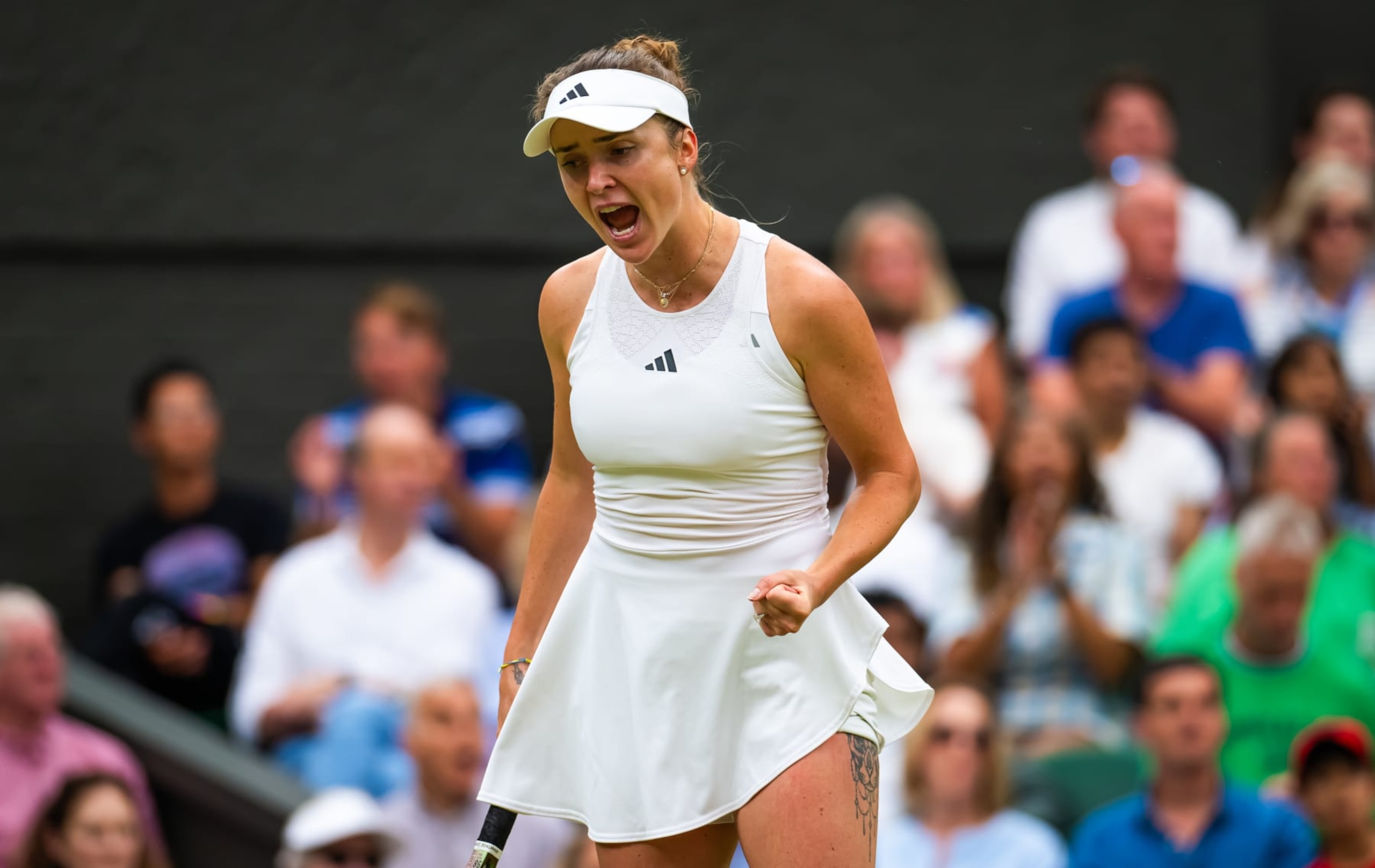 LONDON, ENGLAND - JULY 10: Elina Svitolina of Ukraine in action against Iga Swiatek of Poland in the quarter-final during Day Nine of The Championships Wimbledon 2023 at All England Lawn Tennis and Croquet Club on July 10, 2023 in London, England (Photo by Robert Prange/Getty Images)
