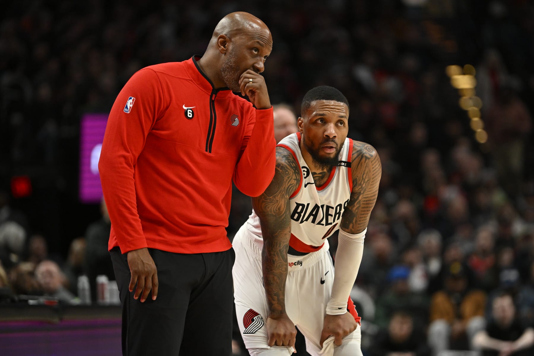 PORTLAND, OREGON - FEBRUARY 06: Head coach Chauncey Billups and Damian Lillard #0 of the Portland Trail Blazers talk during the third quarter against the Milwaukee Bucks at the Moda Center on February 06, 2023 in Portland, Oregon. The Milwaukee Bucks won 127-108. NOTE TO USER: User expressly acknowledges and agrees that, by downloading and or using this photograph, User is consenting to the terms and conditions of the Getty Images License Agreement. (Photo by Alika Jenner/Getty Images)