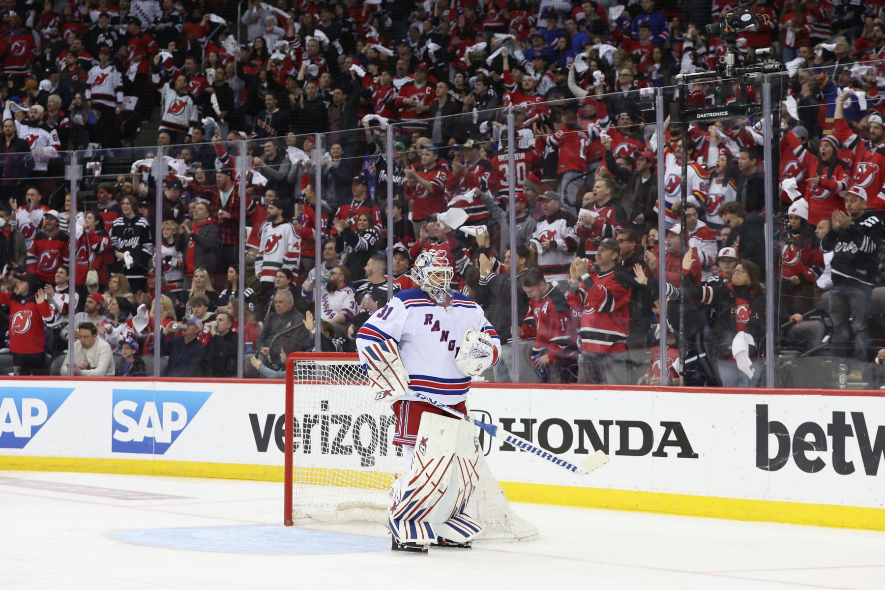 NEWARK, NJ - MAY 01: New Jersey Devils react behind New York Rangers goaltender Igor Shesterkin (31) during Game 7 of an Eastern Conference First Round playoff game between the New York Rangers and the New Jersey Devils on May 1, 2023, at Prudential Center in Newark, New Jersey. (Photo by Andrew Mordzynski/Icon Sportswire via Getty Images)