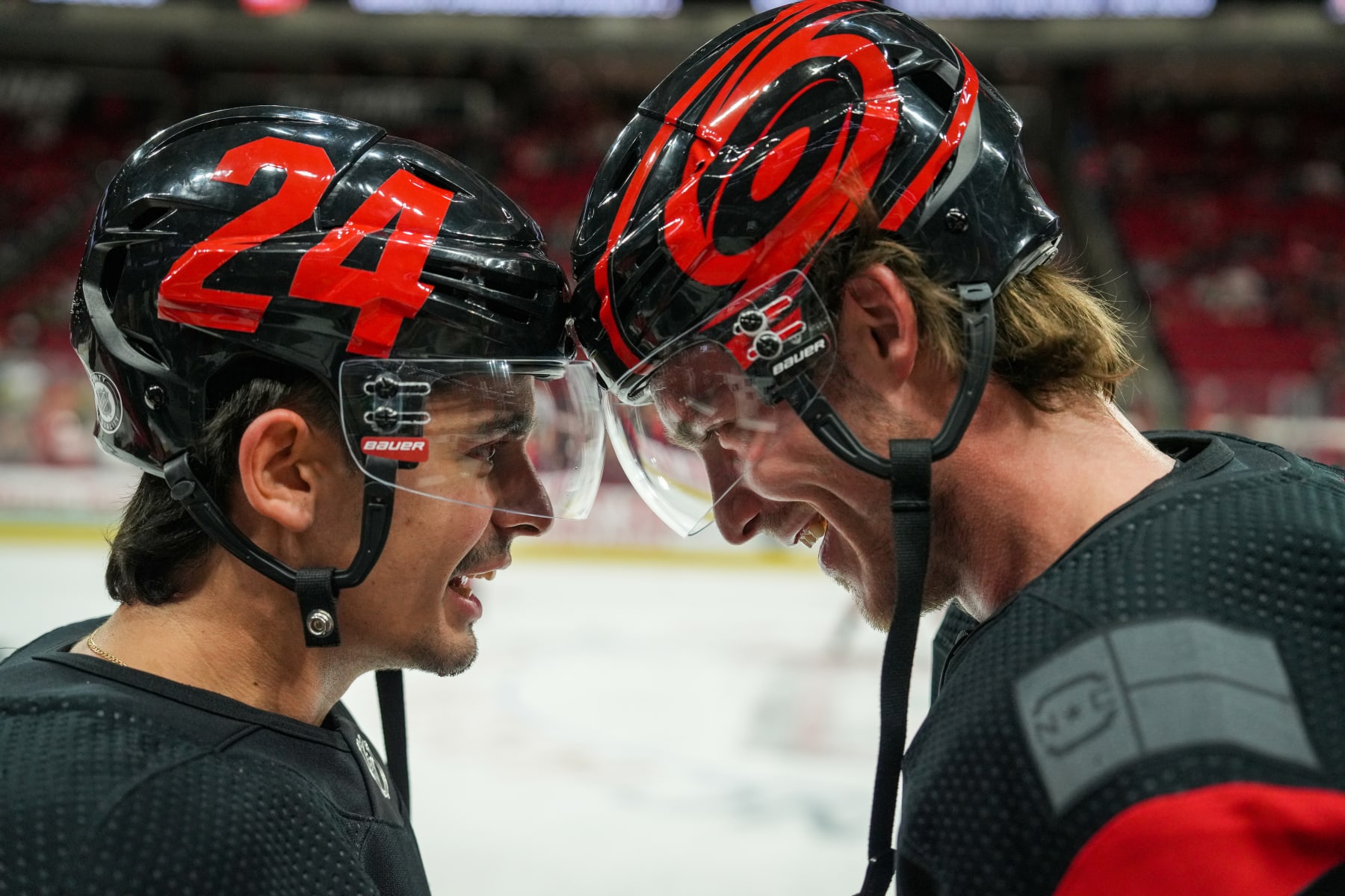 RALEIGH, NORTH CAROLINA - MARCH 11: Seth Jarvis #24 and Andrei Svechnikov #37 of the Carolina Hurricanes are seen prior to the game against the Vegas Golden Knights at PNC Arena on March 11, 2023 in Raleigh, North Carolina. (Photo by Josh Lavallee/NHLI via Getty Images)