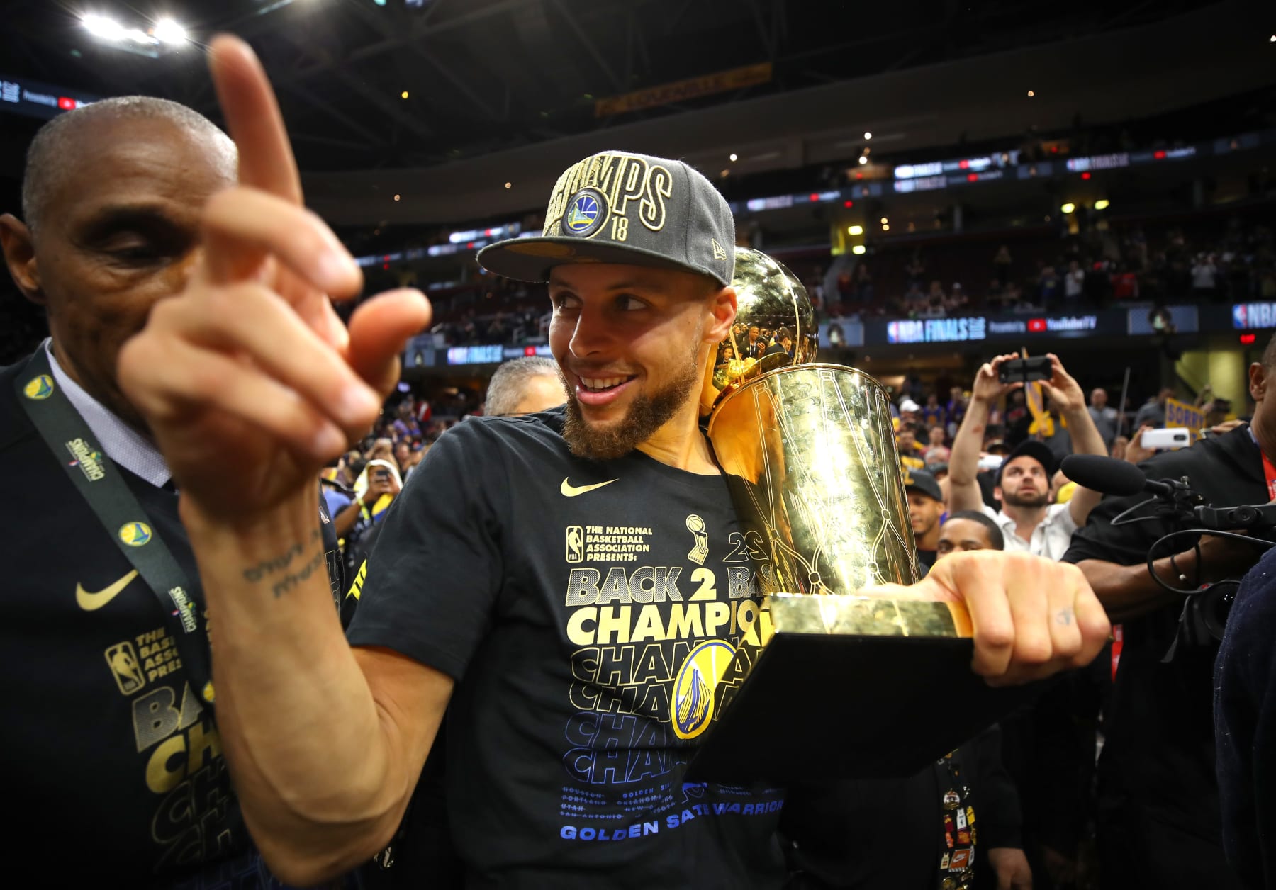CLEVELAND, OH - JUNE 08:  Stephen Curry #30 of the Golden State Warriors celebrates with the Larry O'Brien Trophy after defeating the Cleveland Cavaliers during Game Four of the 2018 NBA Finals at Quicken Loans Arena on June 8, 2018 in Cleveland, Ohio. The Warriors defeated the Cavaliers 108-85 to win the 2018 NBA Finals. NOTE TO USER: User expressly acknowledges and agrees that, by downloading and or using this photograph, User is consenting to the terms and conditions of the Getty Images License Agreement.  (Photo by Gregory Shamus/Getty Images)