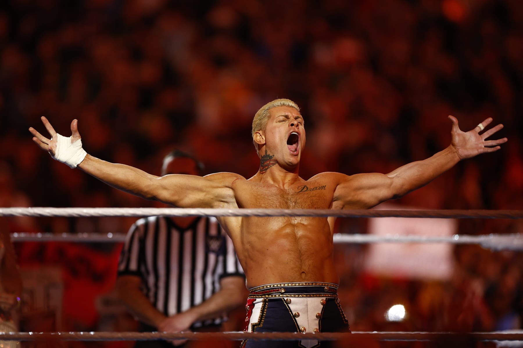INGLEWOOD, CALIFORNIA - APRIL 02:  (L-R) Cody Rhodes wrestles Roman Reigns for Undisputed WWE Universal Title Match during WrestleMania Goes Hollywood at SoFi Stadium on April 02, 2023 in Inglewood, California.
 (Photo by Ronald Martinez/Getty Images)